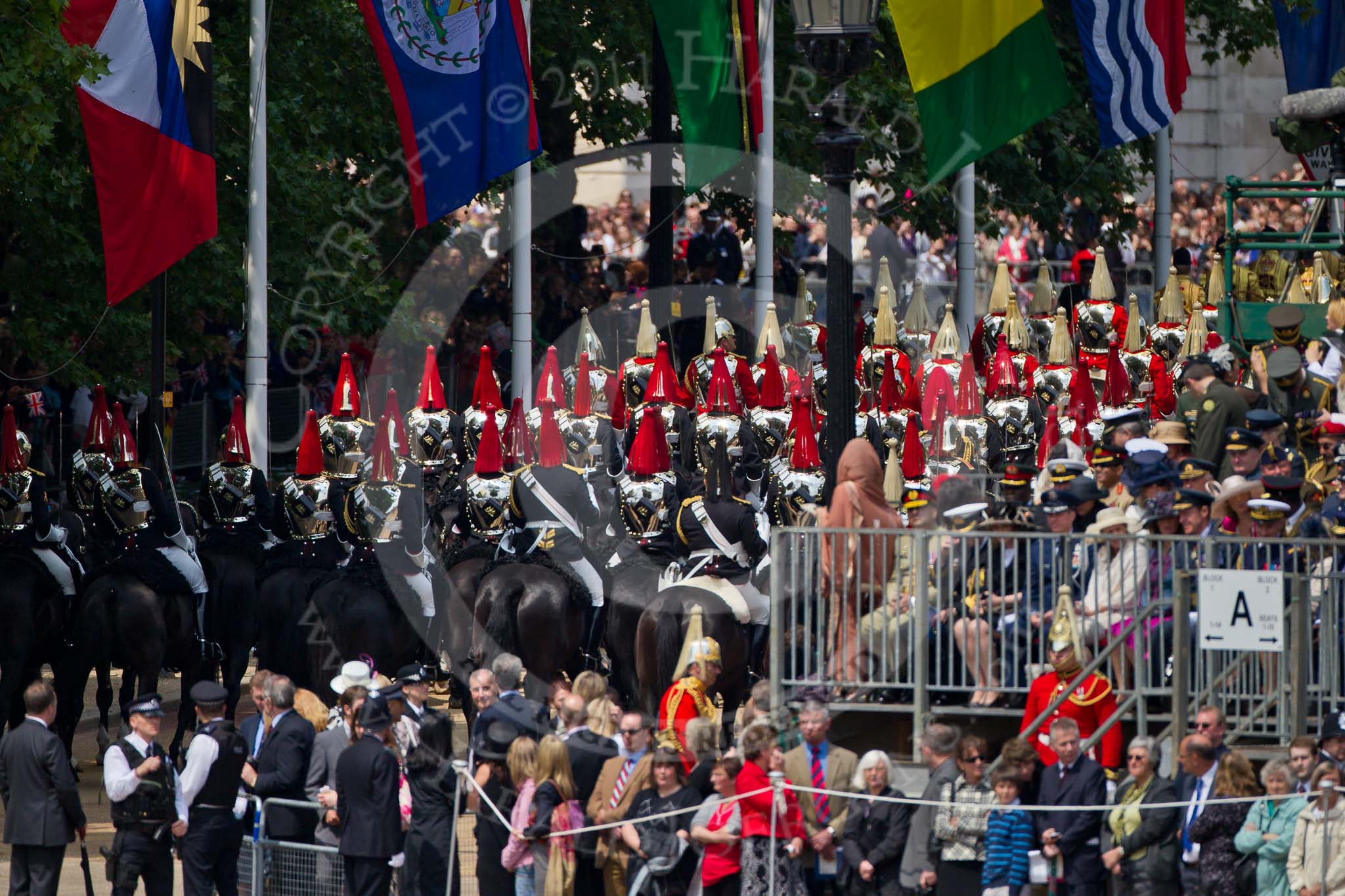 Trooping the Colour 2011: Marching off - the Household Cavalry, here The Life Guards, with the white pumes, followed by the Blues and Royals (red plumes) leaving Horse Guards Parade towards The Mall..
Horse Guards Parade, Westminster,
London SW1,
Greater London,
United Kingdom,
on 11 June 2011 at 12:07, image #398