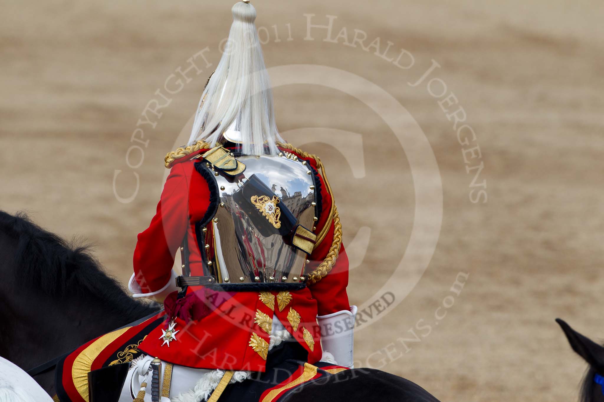 Trooping the Colour 2011: A trooper of The Life Guards  during March Off. The reflection shows Horse Guards Building..
Horse Guards Parade, Westminster,
London SW1,
Greater London,
United Kingdom,
on 11 June 2011 at 12:11, image #427