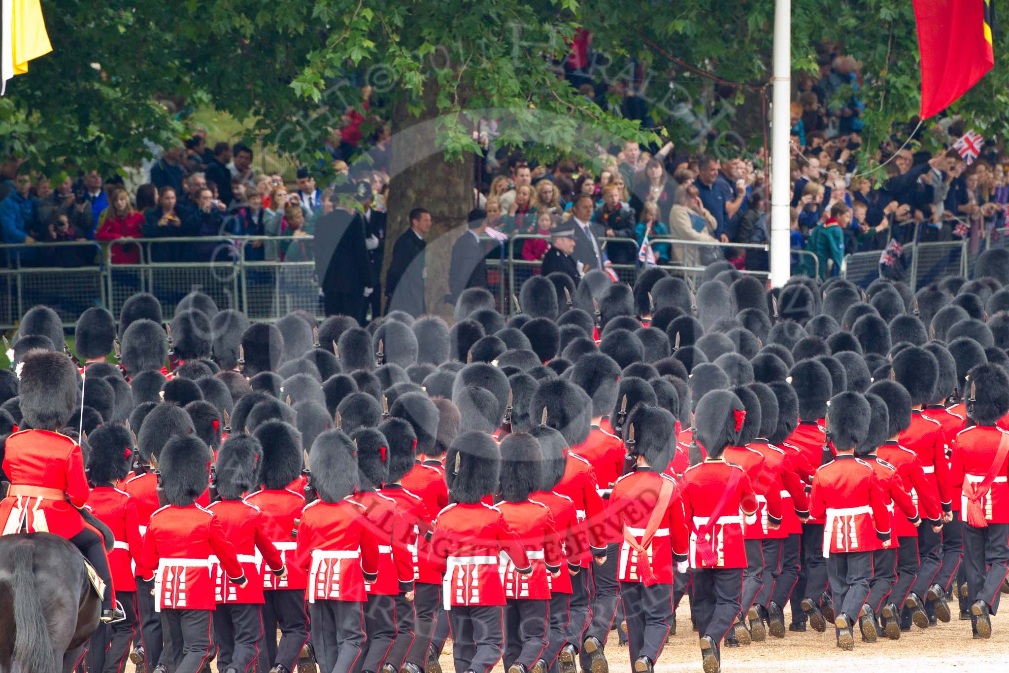 Trooping the Colour 2011: Marching off - No. 5 Guard, 1st Battalion Welsh Guards, followed by No. 6 Guard, No. 7 Company Coldstream Guards, leaving Horse Guards Parade towards The Mall..
Horse Guards Parade, Westminster,
London SW1,
Greater London,
United Kingdom,
on 11 June 2011 at 12:12, image #433