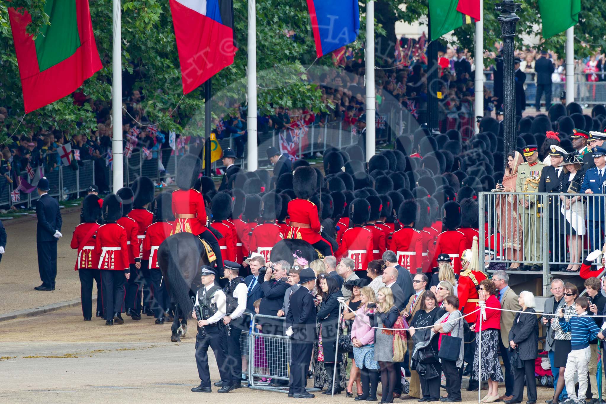 Trooping the Colour 2011: The last group of guardsmen to leave te parade ground at the end of the event, No. 6 Guard, No. 7 Company, Coldstream Guards..
Horse Guards Parade, Westminster,
London SW1,
Greater London,
United Kingdom,
on 11 June 2011 at 12:13, image #437