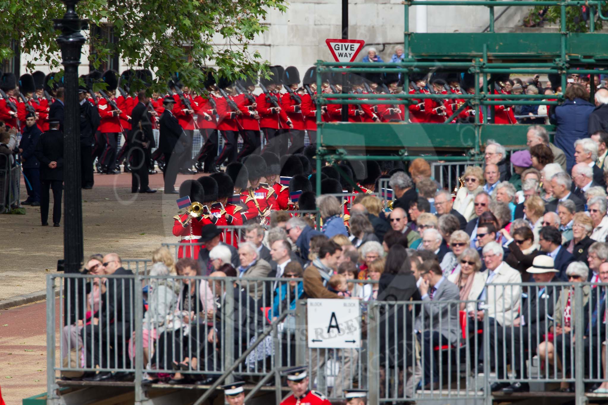 The Colonel's Review 2012: The Band of the Irish Guards on the way towards Horse Guards Parade, behind them No. 5 Guard (1st Battalion Irish Guards) still on the Mall..
Horse Guards Parade, Westminster,
London SW1,

United Kingdom,
on 09 June 2012 at 10:21, image #41