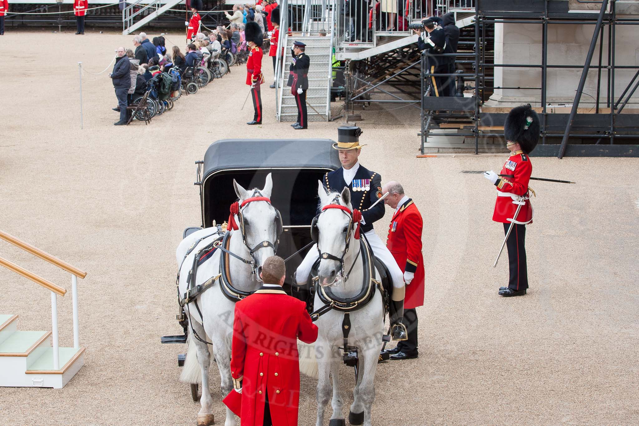 The Colonel's Review 2012: Royal Coachman Jack Hargreaves with the two Windsor Grey horses that would pull the Ivory Mounted Phaeton with Her Majesty during the parade. On the right GSM 'Billy'' Mott..
Horse Guards Parade, Westminster,
London SW1,

United Kingdom,
on 09 June 2012 at 10:58, image #162