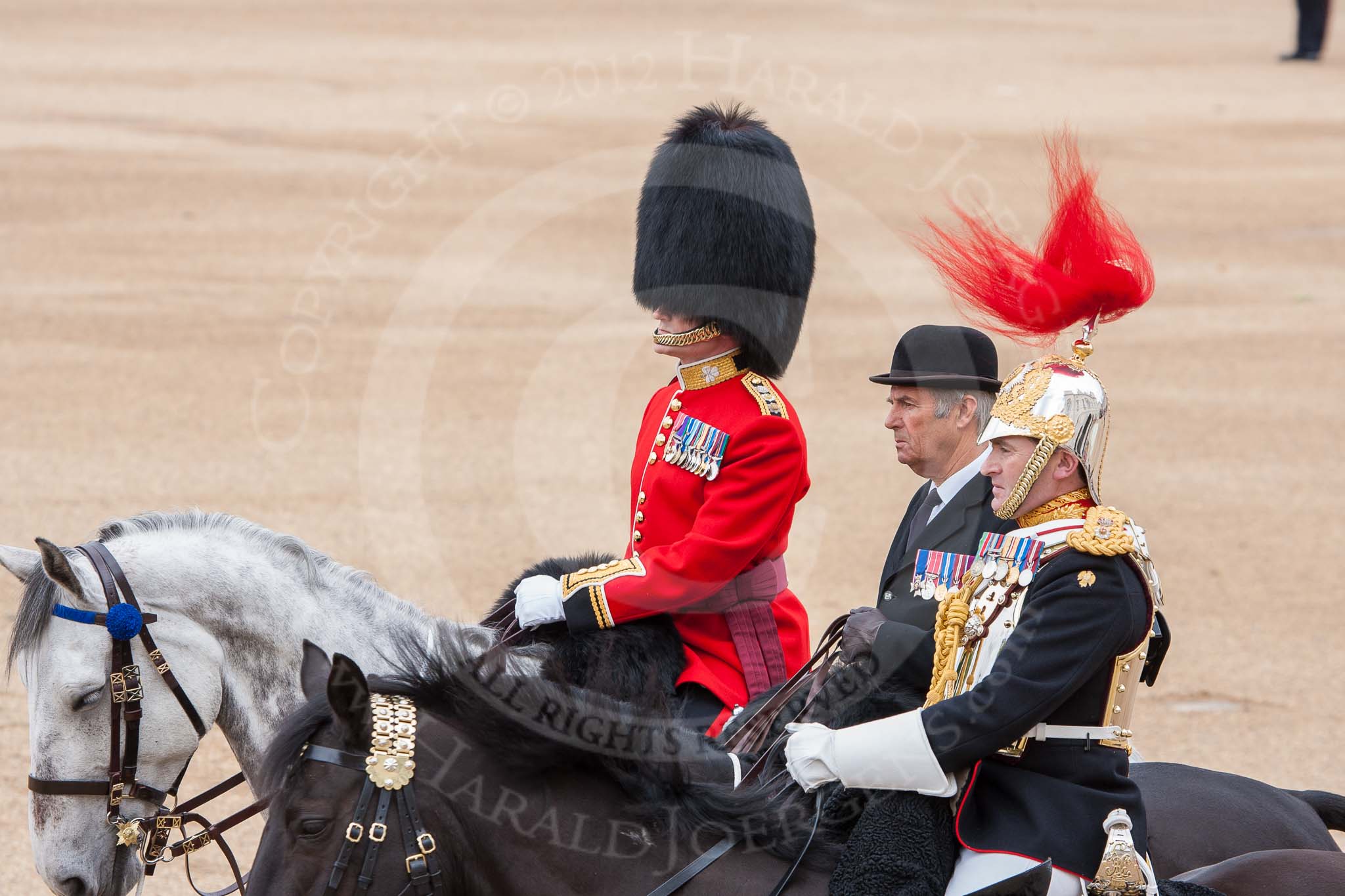 The Colonel's Review 2012: Representing the Royal Colonels (guessing here!): On the left, a Captain of the Irish Guards, riding the horse of the Duke of Cambridge, in the middle the Queen's Stud Groom, riding the Prince of Wales's horse, and on the right a Lieutenant Colonel of the Blues and Royal, riding the horse of the Princess Royal..
Horse Guards Parade, Westminster,
London SW1,

United Kingdom,
on 09 June 2012 at 10:59, image #166