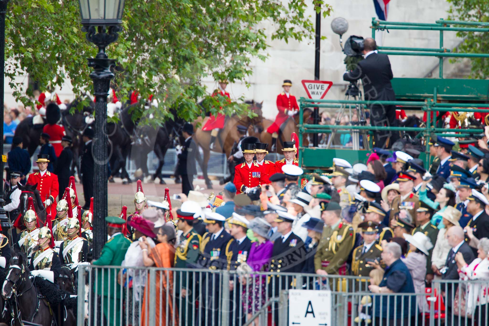 Trooping the Colour 2012: Behind the Blues and Royals, two Grooms from the Royal Household, and then the first glimpse of the coachmen driving the Glass Coach Her Majesty is using..
Horse Guards Parade, Westminster,
London SW1,

United Kingdom,
on 16 June 2012 at 10:57, image #148