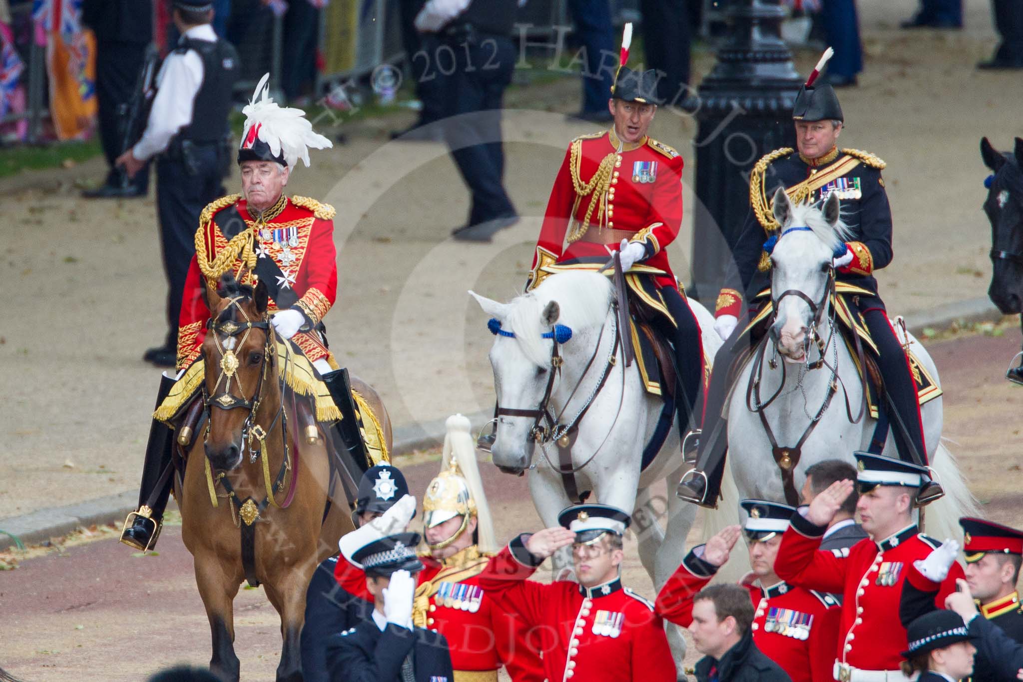 Trooping the Colour 2012: The Master of the Horse, The Lord Vestey, behind him, in the red uniform, the Equerry in Waiting to Her Majesty, Lieutenant Colonel A F Matheson of Matheson, younger, and the Crown Equerry, Colonel W T Browne..
Horse Guards Parade, Westminster,
London SW1,

United Kingdom,
on 16 June 2012 at 10:58, image #152