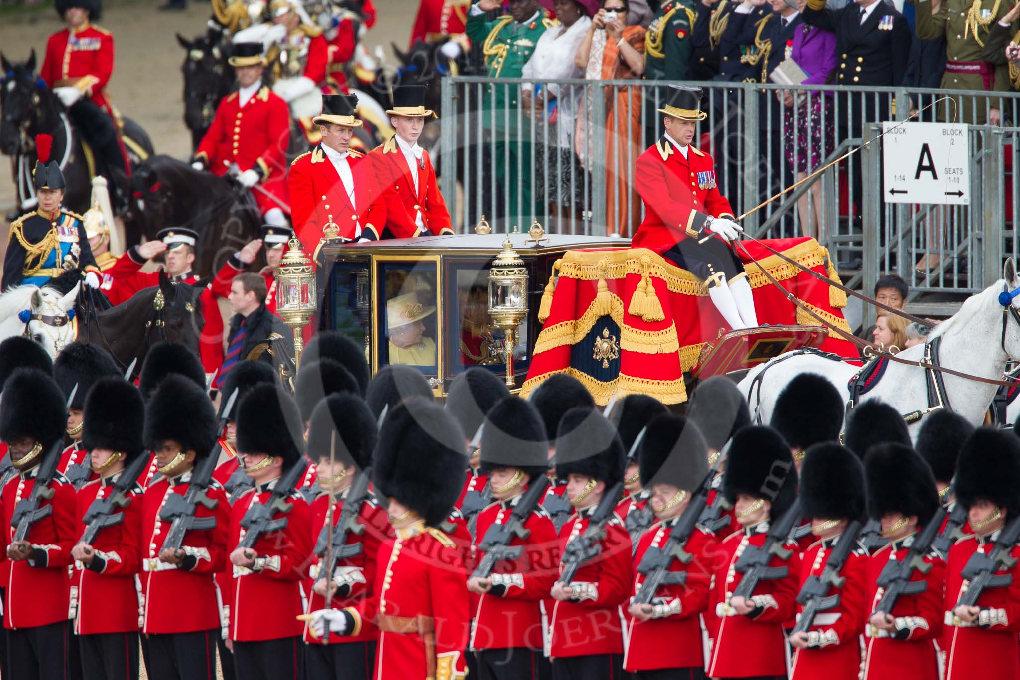 Trooping the Colour 2012: The Glass Coach, and a first glimpse of HM The Queen. On the very left of the image the Princess Royal as Royal Colonel..
Horse Guards Parade, Westminster,
London SW1,

United Kingdom,
on 16 June 2012 at 10:58, image #154