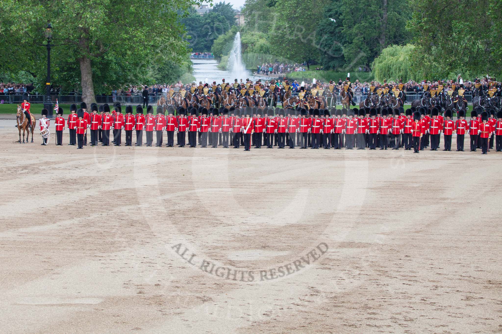 Trooping the Colour 2012: During the Massed Bands Troop: The lone drummer, on the left of No. 1 Guard, with the Major of the Parade next to him, is ready to play the Drummer's Call. In front of No. 1 Guard, with the white colour belt, the Ensign, Hugo Codrington..
Horse Guards Parade, Westminster,
London SW1,

United Kingdom,
on 16 June 2012 at 11:15, image #287