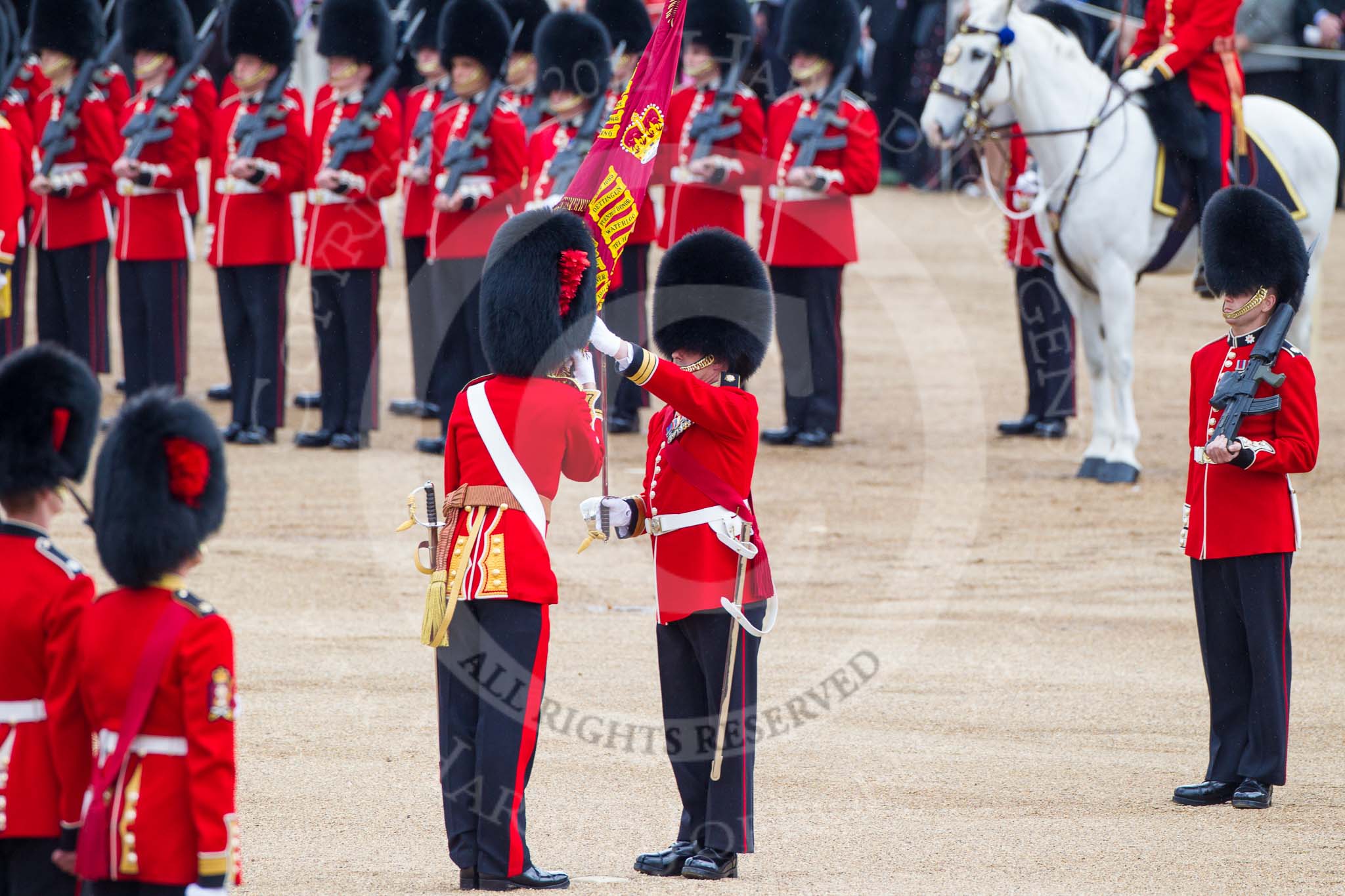 Trooping the Colour 2012: The Colour is placed in the white colour belt the Ensign is wearing..
Horse Guards Parade, Westminster,
London SW1,

United Kingdom,
on 16 June 2012 at 11:21, image #309