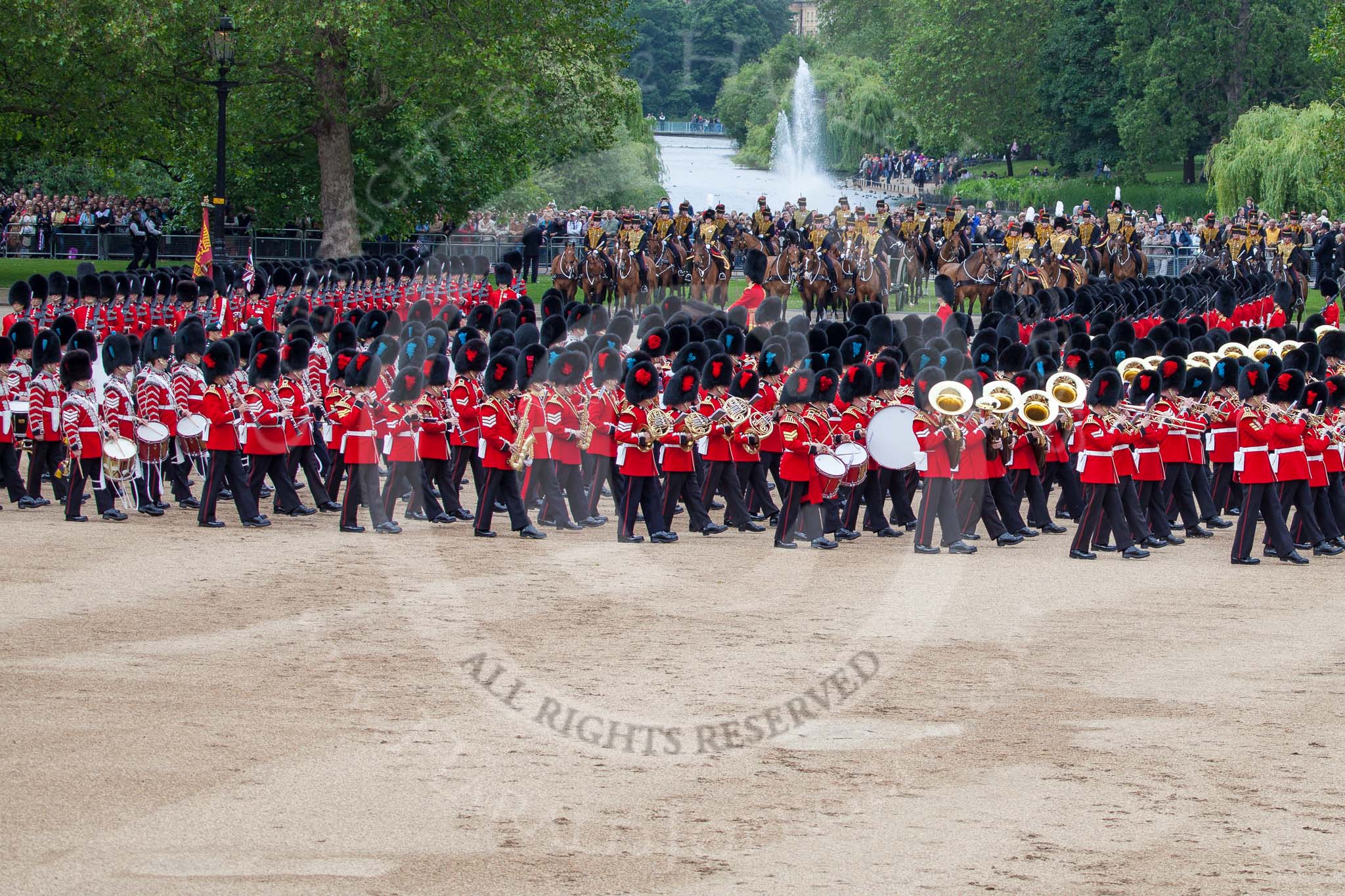 Trooping the Colour 2012: With the Massed Bands playing, the March Past begins. No. 1 Guard, the Escort to the Colour, can be seen on the very left of the image, turning towards the viewer, and marching behind the Massed Bands..
Horse Guards Parade, Westminster,
London SW1,

United Kingdom,
on 16 June 2012 at 11:32, image #377