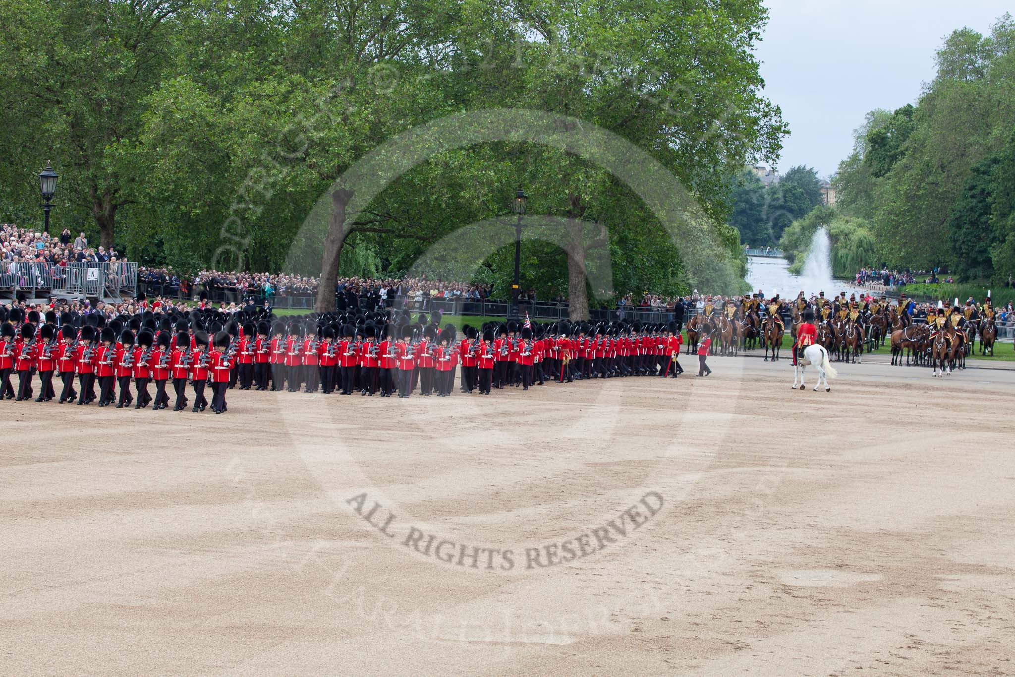 Trooping the Colour 2012: Guards divisions turning left on their anti-clockwise march around Horse Guards Parade. In the background a fountain in St. James's Park..
Horse Guards Parade, Westminster,
London SW1,

United Kingdom,
on 16 June 2012 at 11:34, image #394