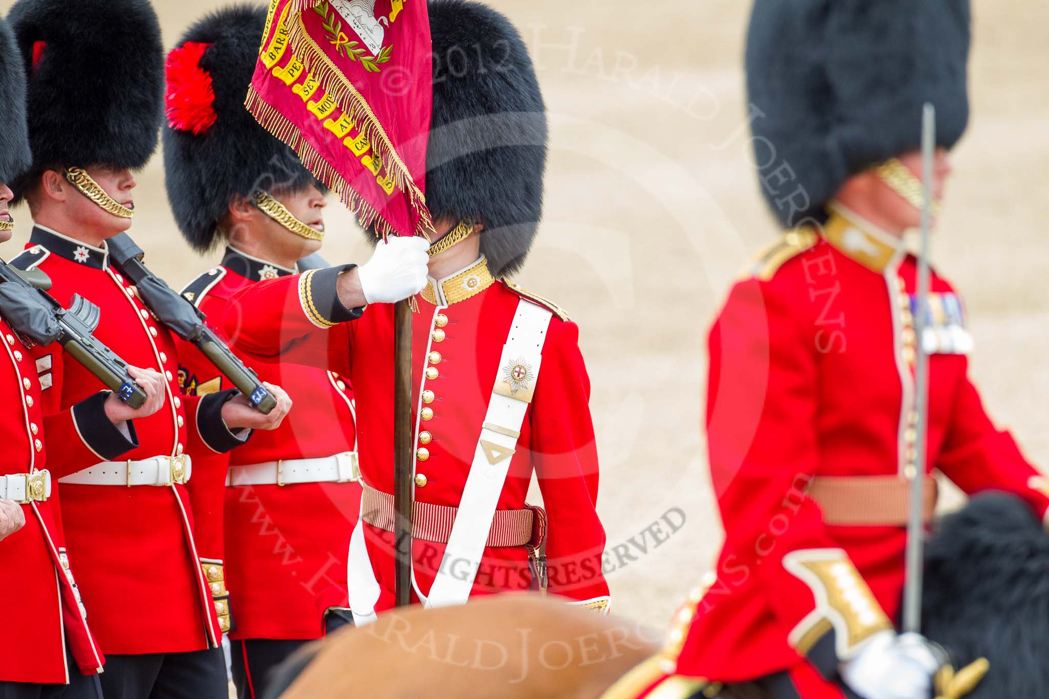 Trooping the Colour 2012: The Ensign, Second Lieutenant H C Codrington, carrying the Colour during the March Past. On the right the Major of the Parade, on the left No. 1 Guard, the Escort to the Colour..
Horse Guards Parade, Westminster,
London SW1,

United Kingdom,
on 16 June 2012 at 11:35, image #403