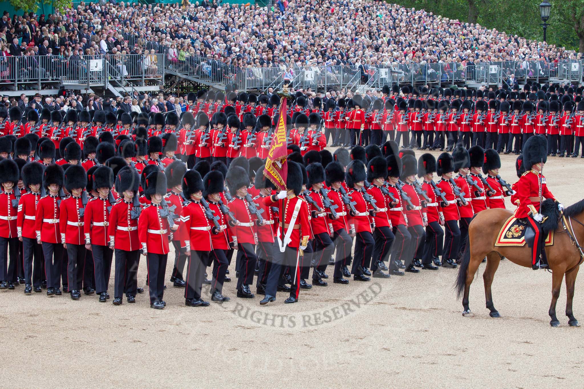 Trooping the Colour 2012: The March Past. On the right the Major of the Parade, behind him the Ensign, carrying the Colour, and all the guards divisions..
Horse Guards Parade, Westminster,
London SW1,

United Kingdom,
on 16 June 2012 at 11:35, image #405