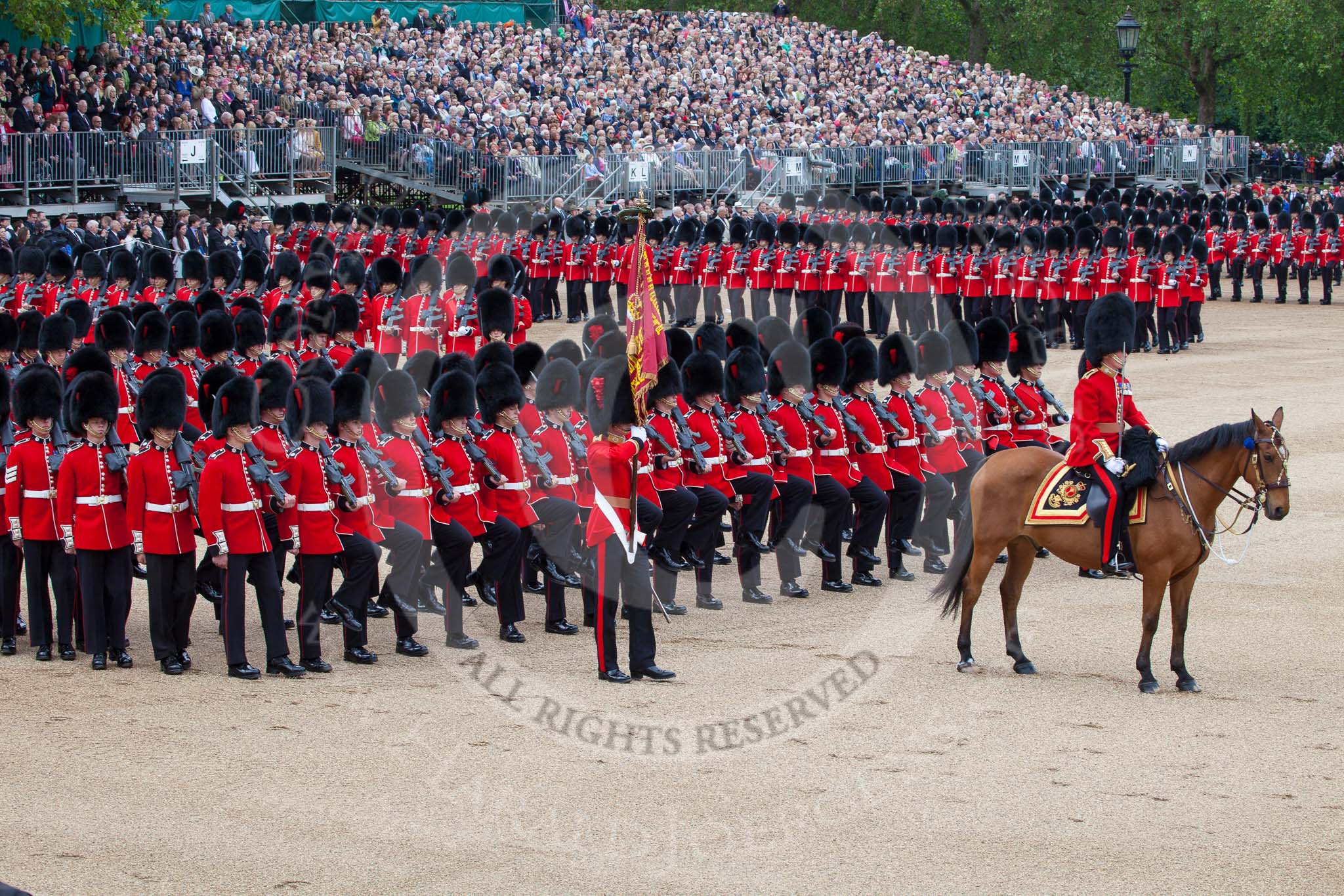 Trooping the Colour 2012: The Ensign, Second Lieutenant H C Codrington, carrying the Colour during the March Past, is now in the right position to carry the Colour past HM The Queen..
Horse Guards Parade, Westminster,
London SW1,

United Kingdom,
on 16 June 2012 at 11:35, image #407