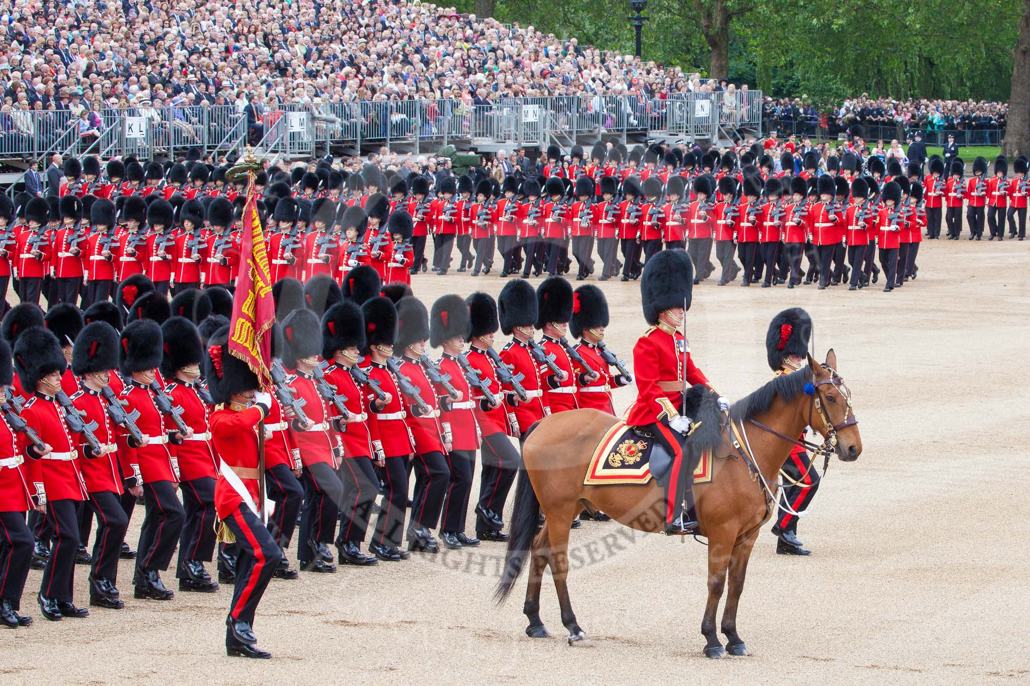 Trooping the Colour 2012: About to march past Her Majesty - the Major of the Parade, Major Mark Lewis, Welsh Guards, the Ensign, carrying the Colour, and the guards divisions..
Horse Guards Parade, Westminster,
London SW1,

United Kingdom,
on 16 June 2012 at 11:35, image #409