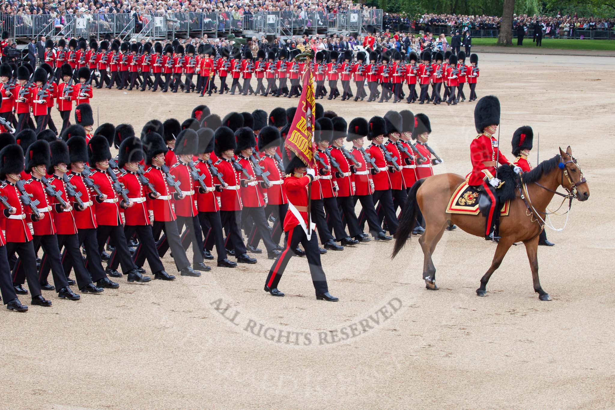 Trooping the Colour 2012: About to march past Her Majesty - the Major of the Parade, Major Mark Lewis, Welsh Guards, the Ensign, Second Lieutenant Hugo Codrington, carrying the Colour, and the guards divisions..
Horse Guards Parade, Westminster,
London SW1,

United Kingdom,
on 16 June 2012 at 11:36, image #411