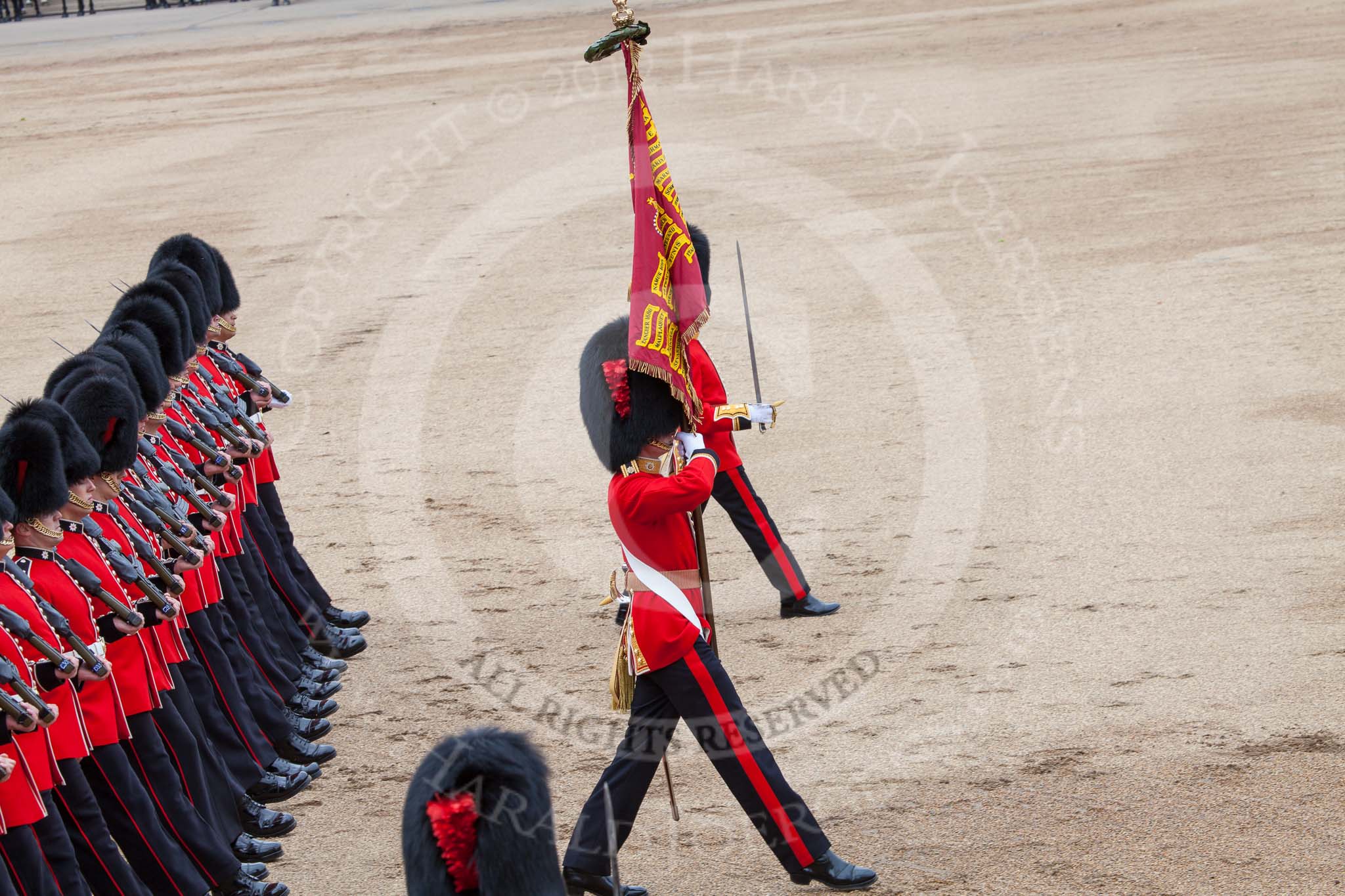 Trooping the Colour 2012: The Ensign, Second Lieutenant Hugo Codrington, carrying the Colour during the March Past..
Horse Guards Parade, Westminster,
London SW1,

United Kingdom,
on 16 June 2012 at 11:36, image #415