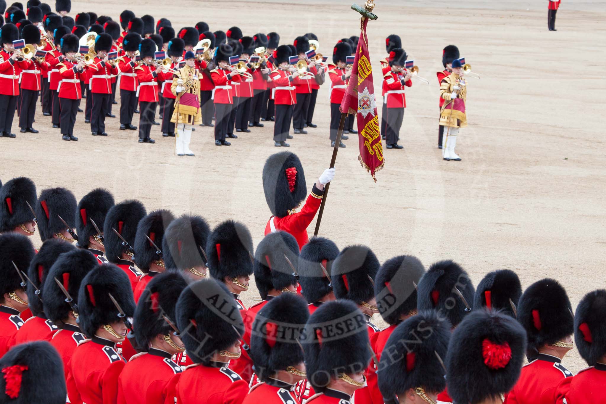 Trooping the Colour 2012: About to lower the Colour in fromt of Her Majesty, the Ensign, Second Lieutenant Hugo Codrington, preparing for the "flourish". It's "Eyes right" for the Escort to the Colour..
Horse Guards Parade, Westminster,
London SW1,

United Kingdom,
on 16 June 2012 at 11:36, image #421