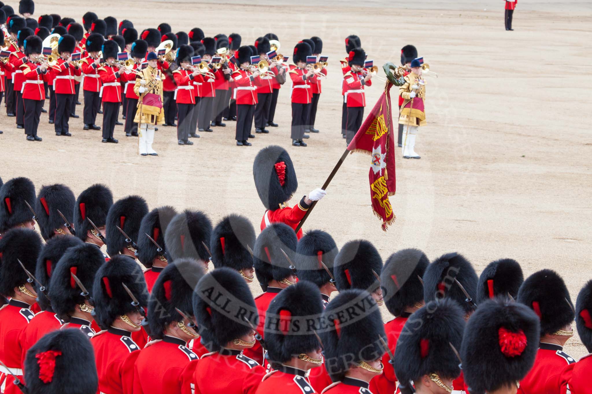 Trooping the Colour 2012: About to lower the Colour in fromt of Her Majesty, the Ensign, Second Lieutenant Hugo Codrington, preparing for the "flourish". It's "Eyes right" for the Escort to the Colour..
Horse Guards Parade, Westminster,
London SW1,

United Kingdom,
on 16 June 2012 at 11:36, image #422