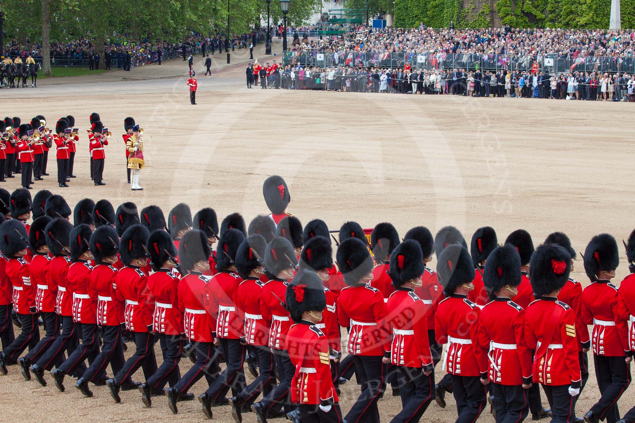 Trooping the Colour 2012: Having lowered the Colour in front of Her Majesty, the Ensign, Second Lieutenant Hugo Codrington, during the "flourish". It's "Eyes right" for the Escort to the Colour..
Horse Guards Parade, Westminster,
London SW1,

United Kingdom,
on 16 June 2012 at 11:37, image #425