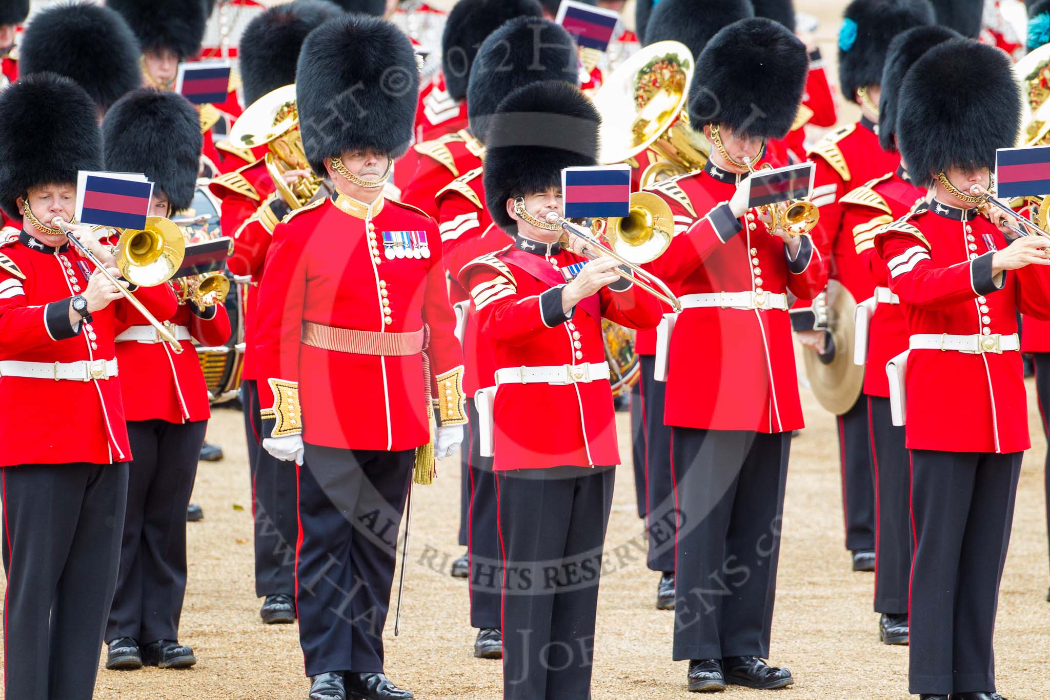 Trooping the Colour 2012: Musicians from the band of the Welsh Guards during the March Past. Second to the left the Senior Director of Music, Lieutenant Colonel S C Barnwell, Welsh Guards..
Horse Guards Parade, Westminster,
London SW1,

United Kingdom,
on 16 June 2012 at 11:39, image #449