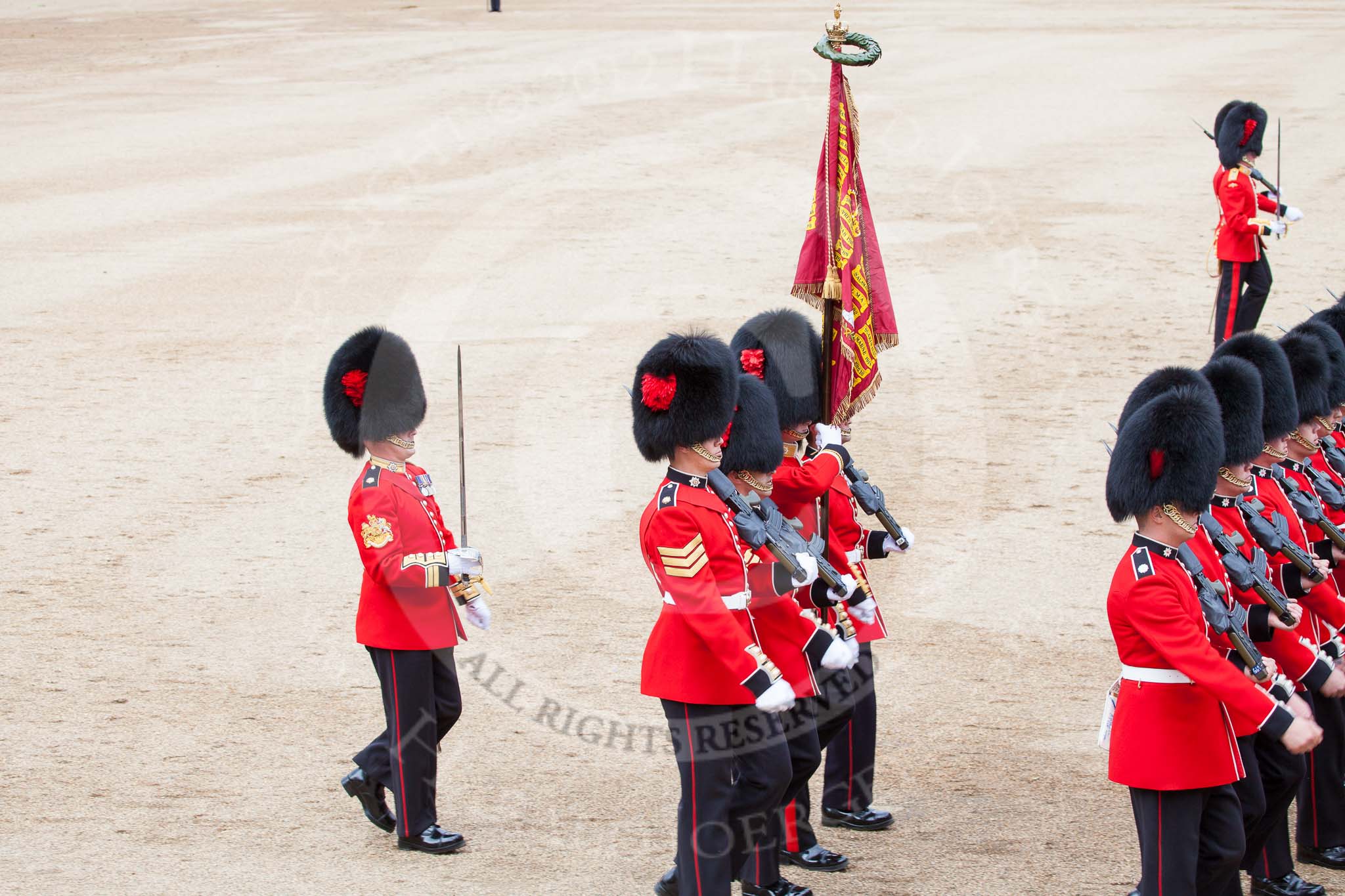 Trooping the Colour 2012: About to parade the Colour in front of Her Majesty, the Ensign, Second Lieutenant Hugo Codrington. To his left the Colour Sergeant, Paul E Baines MC, to his right Sergeant Walker and Sergeant Kashula..
Horse Guards Parade, Westminster,
London SW1,

United Kingdom,
on 16 June 2012 at 11:45, image #488