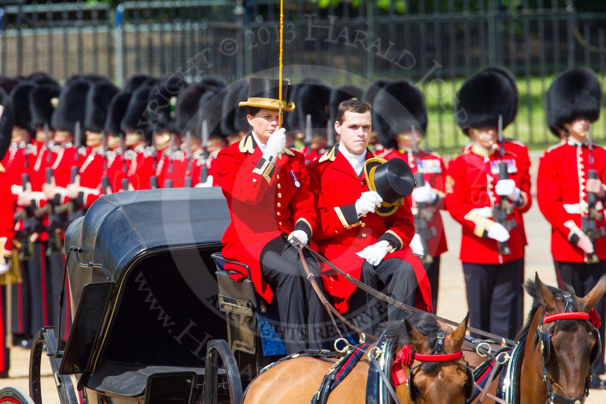 The Colonel's Review 2013: The coachmen salute when passing the Colour..
Horse Guards Parade, Westminster,
London SW1,

United Kingdom,
on 08 June 2013 at 10:51, image #226