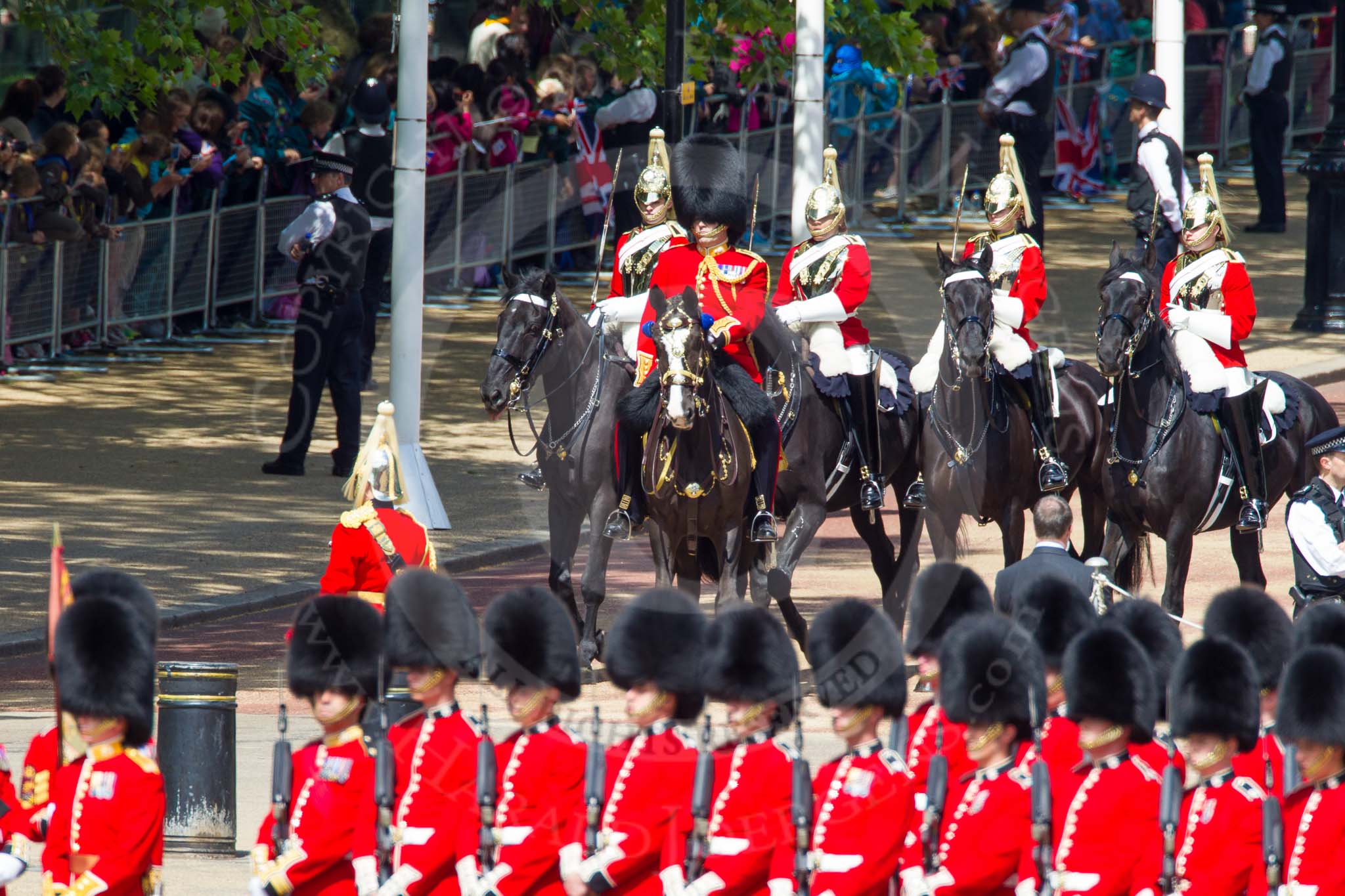 The Colonel's Review 2013: Leading the Royal Procession from The Mall onto Horse Guards Parade - Brigade Major Household Division Lieutenant Colonel Simon Soskin, Grenadier Guards, followed by four Troopers of The Life Guards..
Horse Guards Parade, Westminster,
London SW1,

United Kingdom,
on 08 June 2013 at 10:55, image #240