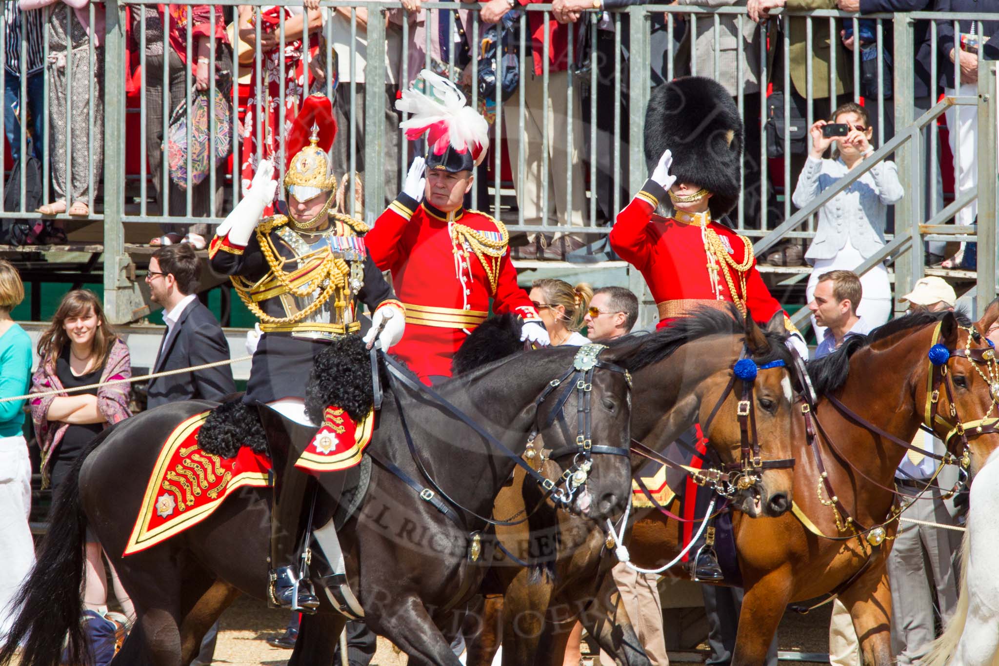 The Colonel's Review 2013: From left to right - Silver-Stick-in-Waiting, Colonel S H Cowen, The Blues and Royals, 
Chief of Staff, Colonel R H W St G Bodington, Welsh Guards, and Aide-de-Camp, Captain J J Hathaway-White, Grenadier Guards, saluting the Colour..
Horse Guards Parade, Westminster,
London SW1,

United Kingdom,
on 08 June 2013 at 11:00, image #285