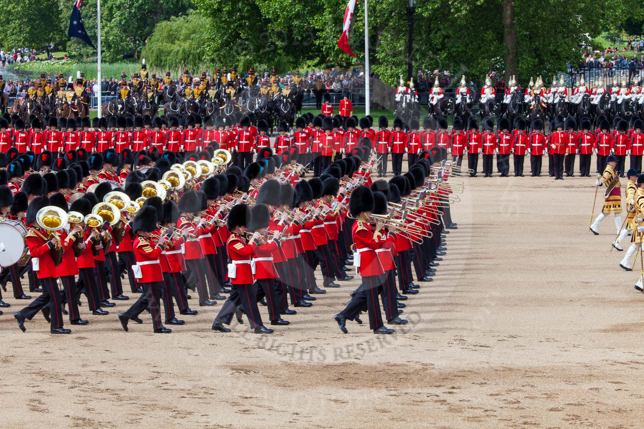 The Colonel's Review 2013: The Massed Band Troop -  the slow march is the Waltz from Les Huguenots. No. 1 Guard, the Escort for the Colour, No.2 Guard in the centre. The King's Troop Royal Horse Artillery, the First and Second Divisions of the Sovereign's Escort can be seen on top of the image..
Horse Guards Parade, Westminster,
London SW1,

United Kingdom,
on 08 June 2013 at 11:08, image #428