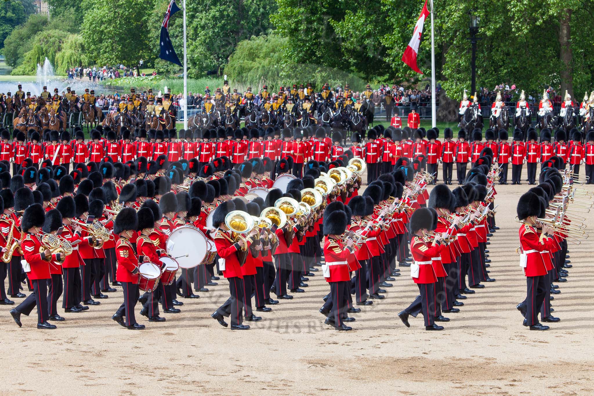 The Colonel's Review 2013: The Massed Band Troop -  the slow march is the Waltz from Les Huguenots. No. 1 Guard, the Escort for the Colour, No.2 Guard in the centre. The King's Troop Royal Horse Artillery, the First and Second Divisions of the Sovereign's Escort can be seen on top of the image..
Horse Guards Parade, Westminster,
London SW1,

United Kingdom,
on 08 June 2013 at 11:08, image #429