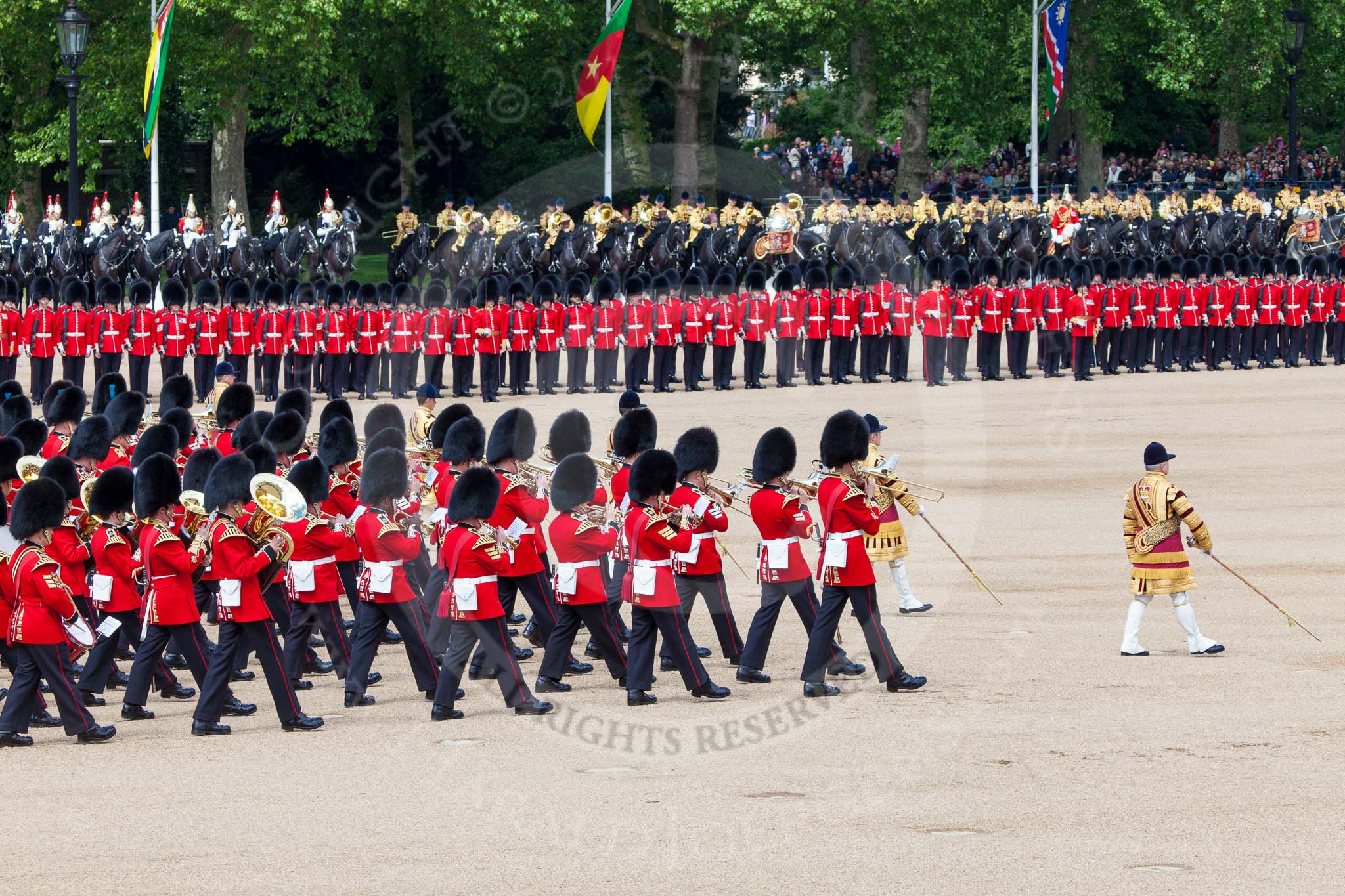 The Colonel's Review 2013: The Massed Band Troop begins with the slow march - the Waltz from Les Huguenots. The Third and Fourth Division of the Sovereign's Escort, The Blues and Royals, and, next to them, the Mounted Bands of the Household Cavalry, can be seen on top of the image..
Horse Guards Parade, Westminster,
London SW1,

United Kingdom,
on 08 June 2013 at 11:09, image #434