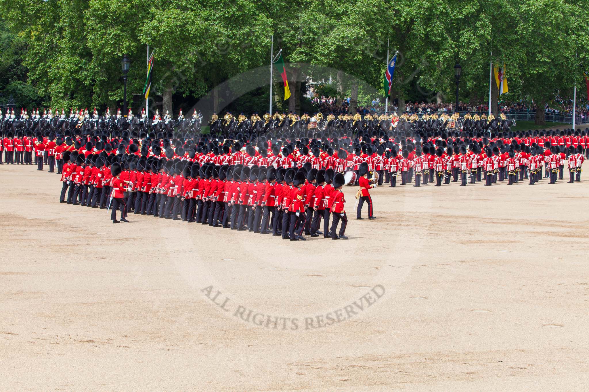 The Colonel's Review 2013: No. 1 Guard (Escort for the Colour),1st Battalion Welsh Guards is about to reveive the Colour. In front the Ensign, Second Lieutenant Joel Dinwiddle, and the Subaltern, Captain F O Lloyd-George. Behind No. 1 Guard the Regimental Sergeant Major, WO1 Martin Topps, Welsh Guards..
Horse Guards Parade, Westminster,
London SW1,

United Kingdom,
on 08 June 2013 at 11:17, image #491