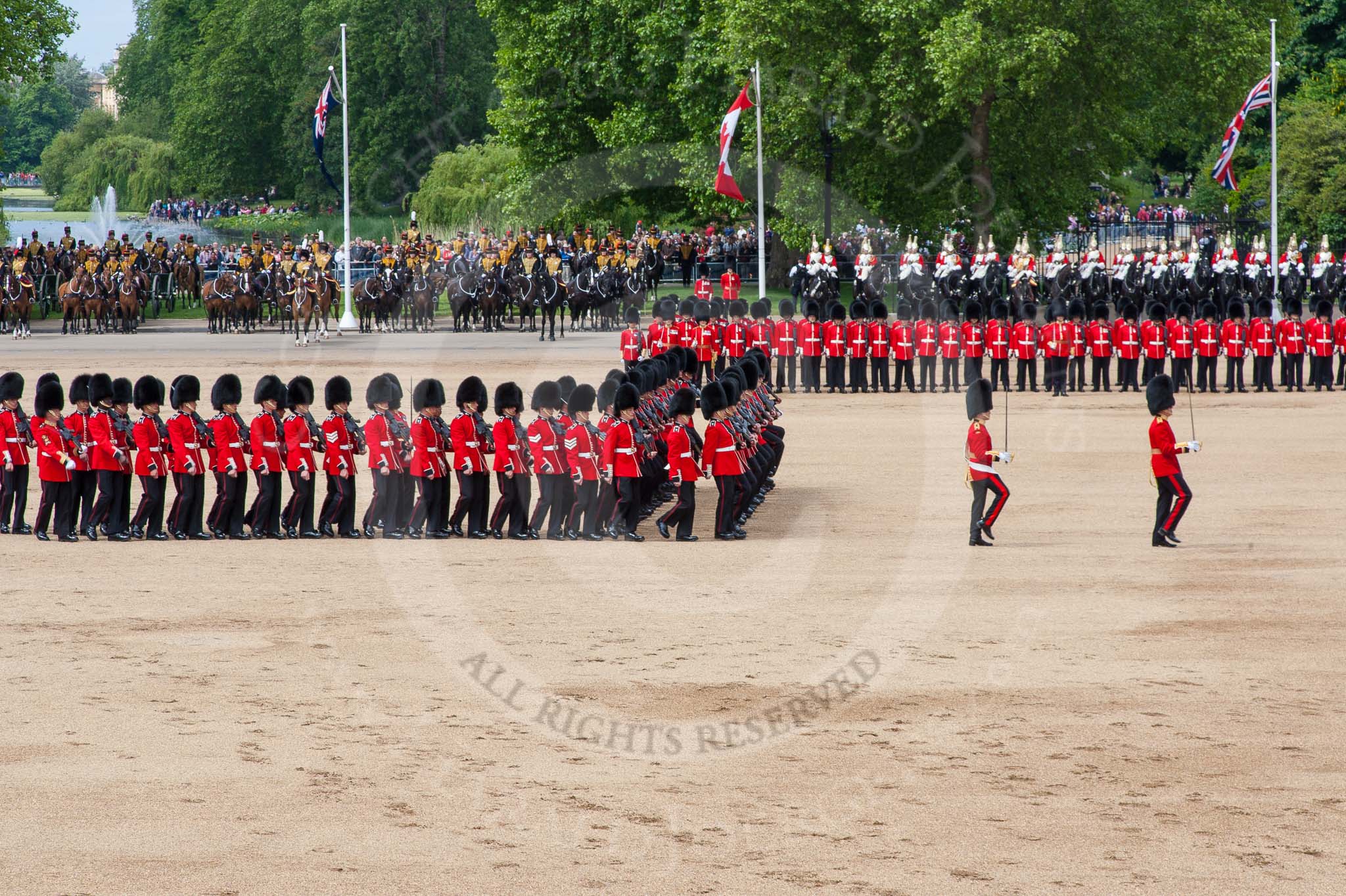 The Colonel's Review 2013: The men of No. 1 Guard (Escort for the Colour),1st Battalion Welsh Guards are moving into a new formation, facing the Coloir Party on the other side of Horse Guards Parade. In front the Ensign, Second Lieutenant Joel Dinwiddle, and the Subaltern, Captain F O Lloyd-George..
Horse Guards Parade, Westminster,
London SW1,

United Kingdom,
on 08 June 2013 at 11:16, image #486