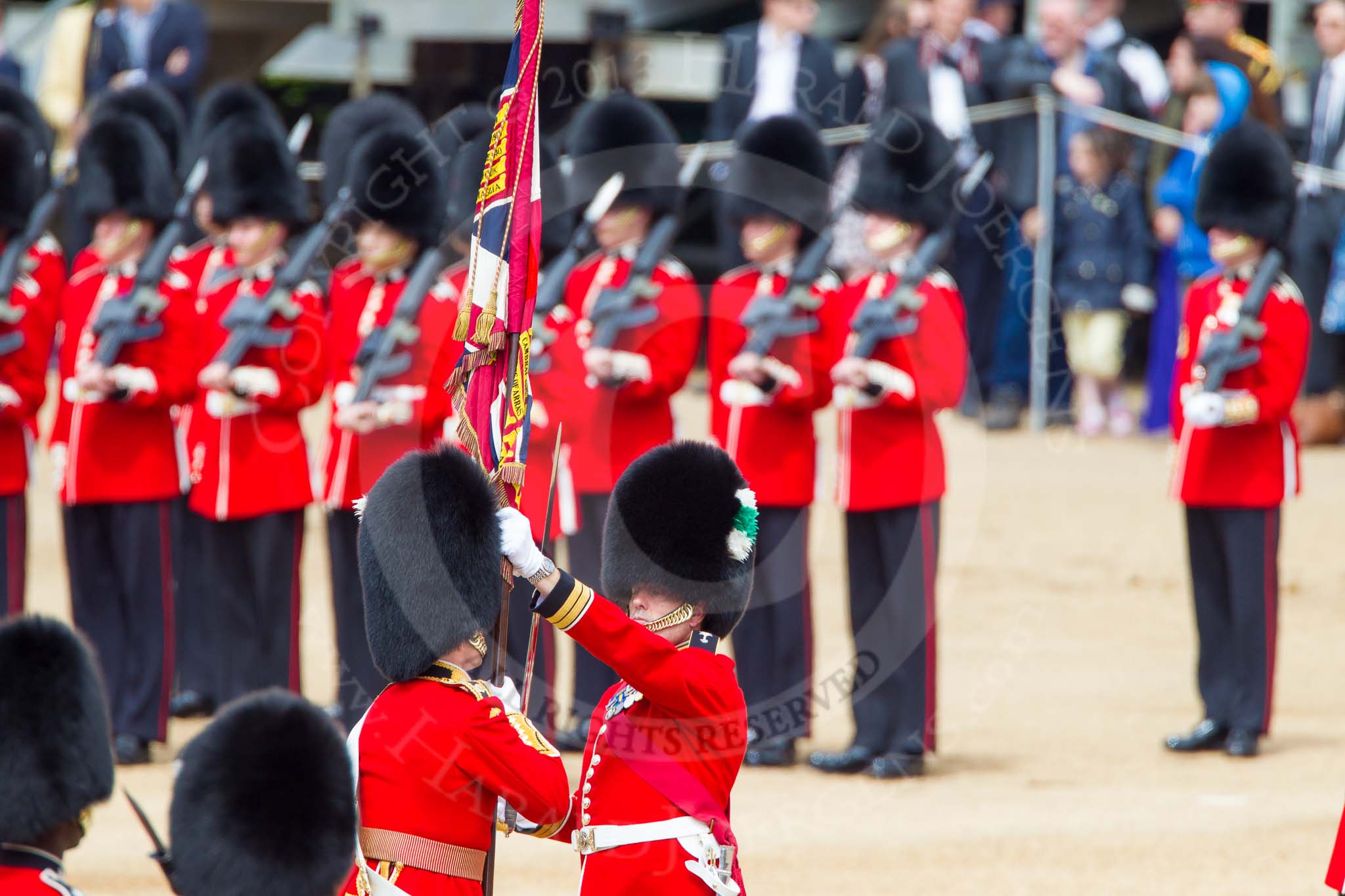 The Colonel's Review 2013: The Ensign, Second Lieutenant Joel Dinwiddle, takes posession of the Colour from the Regimental Sergeant Major, WO1 Martin Topps, Welsh Guards..
Horse Guards Parade, Westminster,
London SW1,

United Kingdom,
on 08 June 2013 at 11:19, image #522