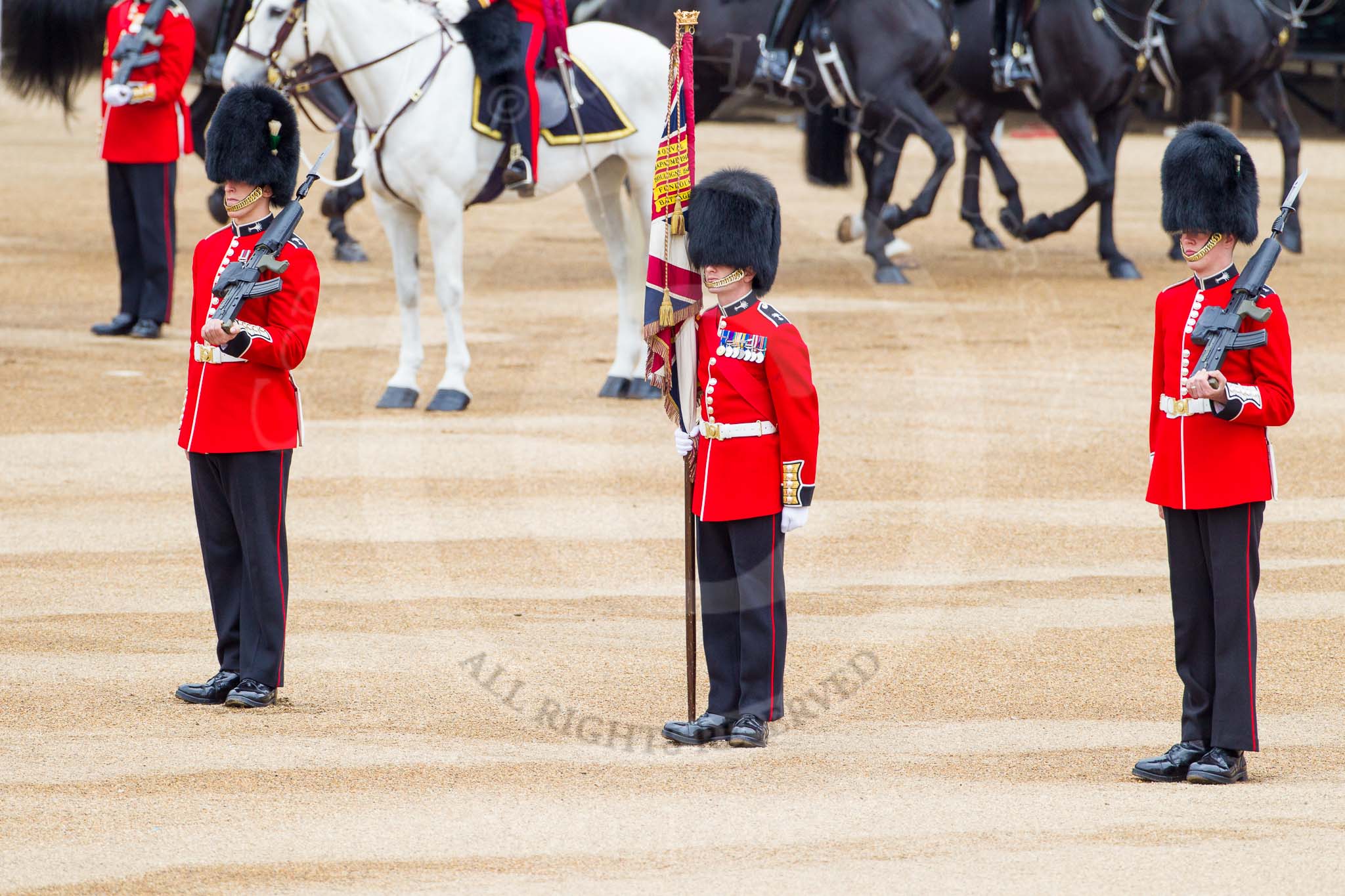 Major General's Review 2013: The Colour is now uncased, and the two sentries patrol to the left and right, to protect the Colour..
Horse Guards Parade, Westminster,
London SW1,

United Kingdom,
on 01 June 2013 at 10:55, image #221