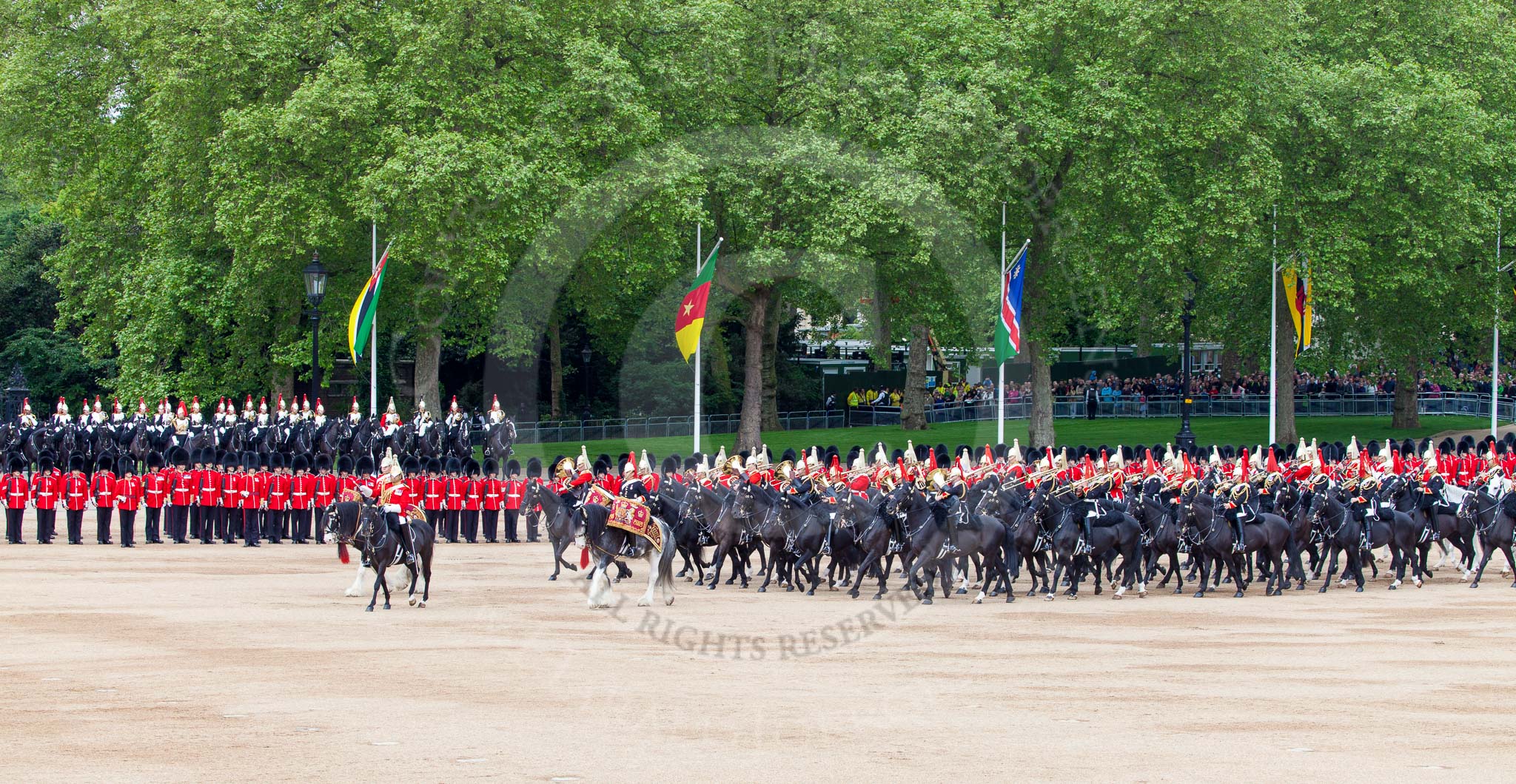 Major General's Review 2013: The Ride Past - the Mounted Bands of the Household Cavalry move, from the eastern side, onto Horse Guards Parade. The Director of Music of the Household Cavalry, Major Paul Wilman, The Life Guards followed by the kettle drummer from The Life Guards..
Horse Guards Parade, Westminster,
London SW1,

United Kingdom,
on 01 June 2013 at 11:50, image #578