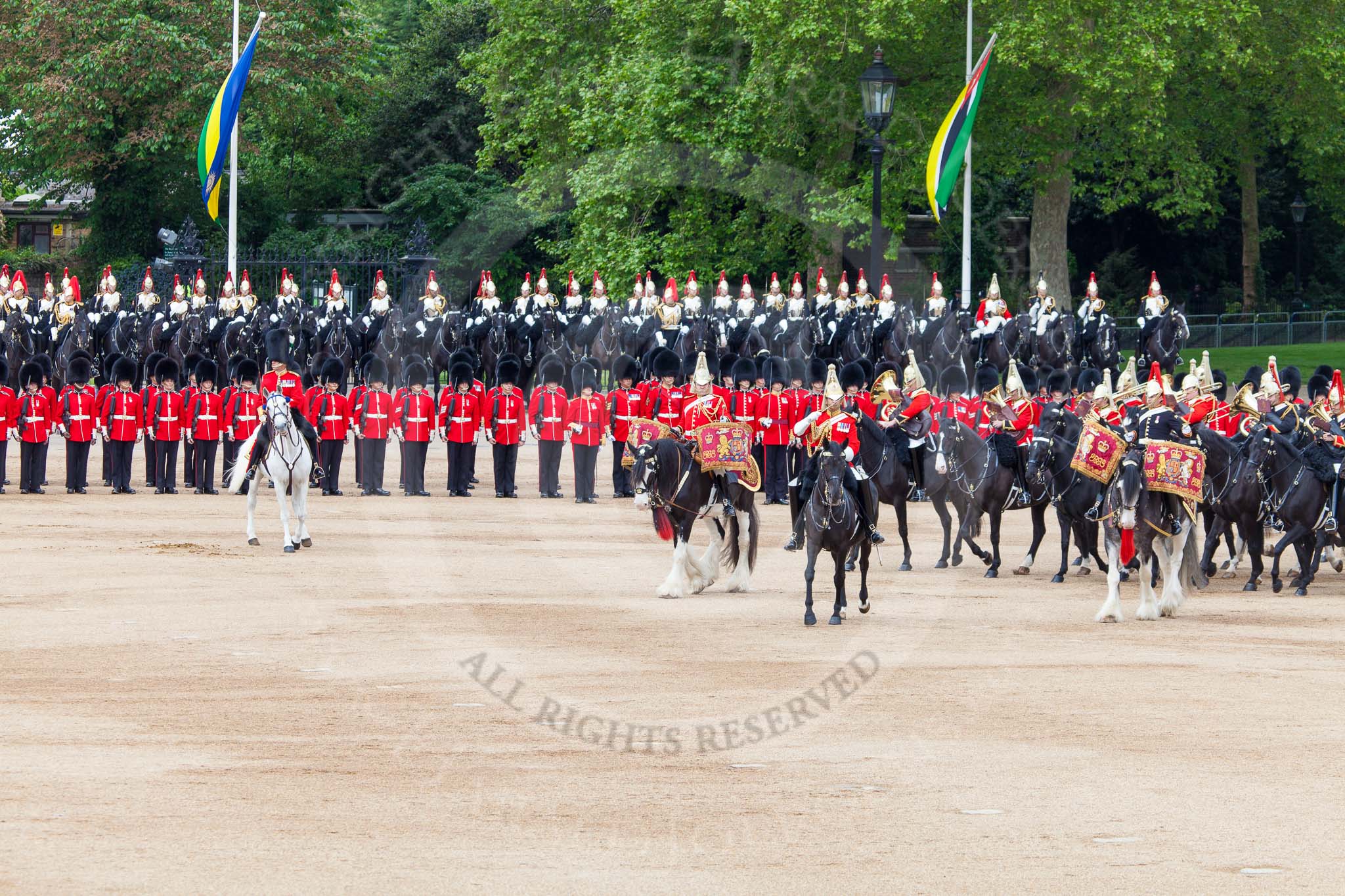 Major General's Review 2013: The Ride Past - the Mounted Bands of the Household Cavalry move, from the eastern side, onto Horse Guards Parade. The Director of Music of the Household Cavalry, Major Paul Wilman, The Life Guards followed by the kettle drummer from The Life Guards..
Horse Guards Parade, Westminster,
London SW1,

United Kingdom,
on 01 June 2013 at 11:50, image #579