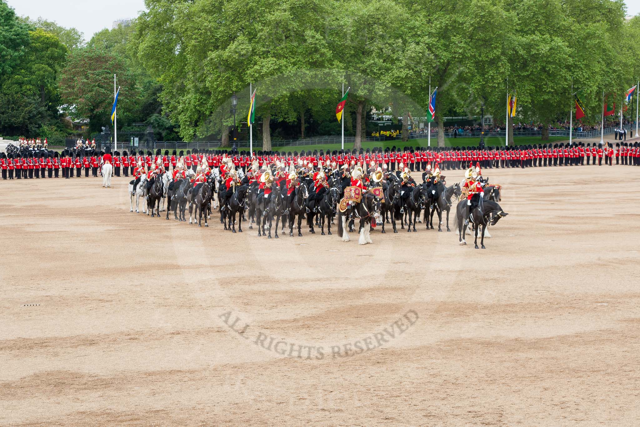 Major General's Review 2013: The Director of Music of the Household Cavalry, Major Paul Wilman, The Life Guards, during the Mounted Troops Ride Past. Behind him the kettle drummer from The Blues and Royals..
Horse Guards Parade, Westminster,
London SW1,

United Kingdom,
on 01 June 2013 at 11:51, image #588