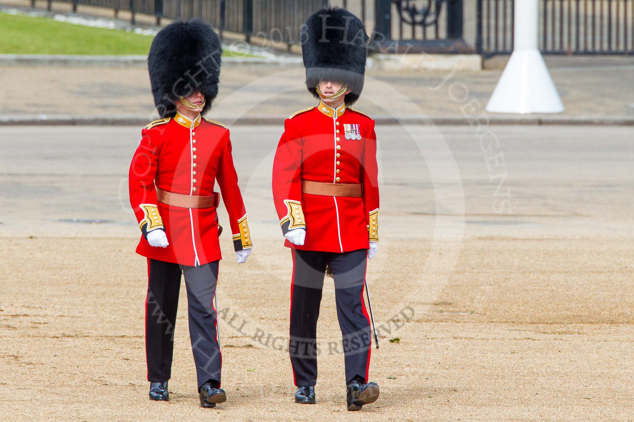 Trooping the Colour 2013: The third pair of officers following the Keepers of the Ground, Second Lieutenant D R Wellham and a Major J M Young, No. 4 Guard, Nijmegen Company Grenadier Guards. Image #32, 15 June 2013 09:56 Horse Guards Parade, London, UK