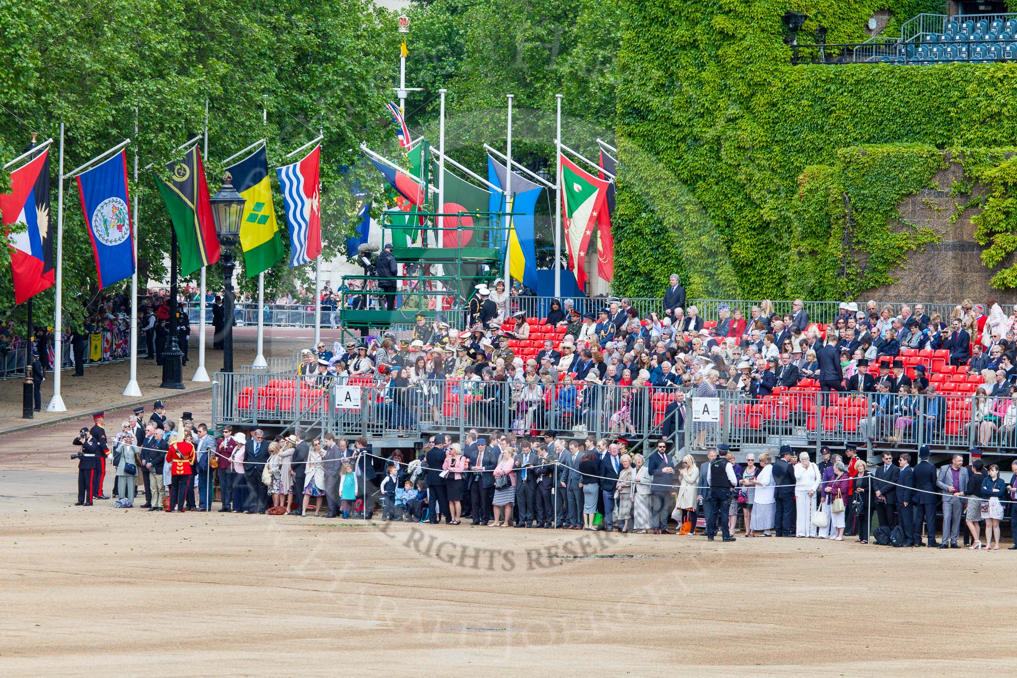 Trooping the Colour 2013: View along Horse Guards Roads towards The Mall. On the very left the Youth Camp. On the right, behind the grandstands, the ivy covered Citadel. Image #35, 15 June 2013 10:02 Horse Guards Parade, London, UK