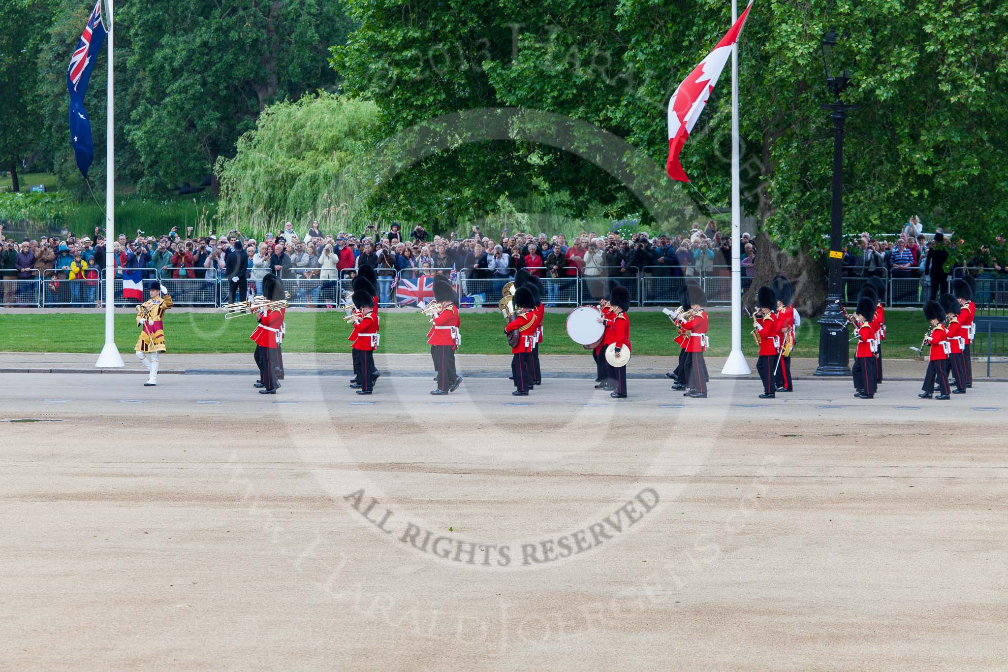 Trooping the Colour 2013: The Band of the Coldstream Guards, led by Senior Drum Major Matthew Betts, Grenadier Guards, is about to turn left onto Horse Guards Parade. Image #44, 15 June 2013 10:11 Horse Guards Parade, London, UK