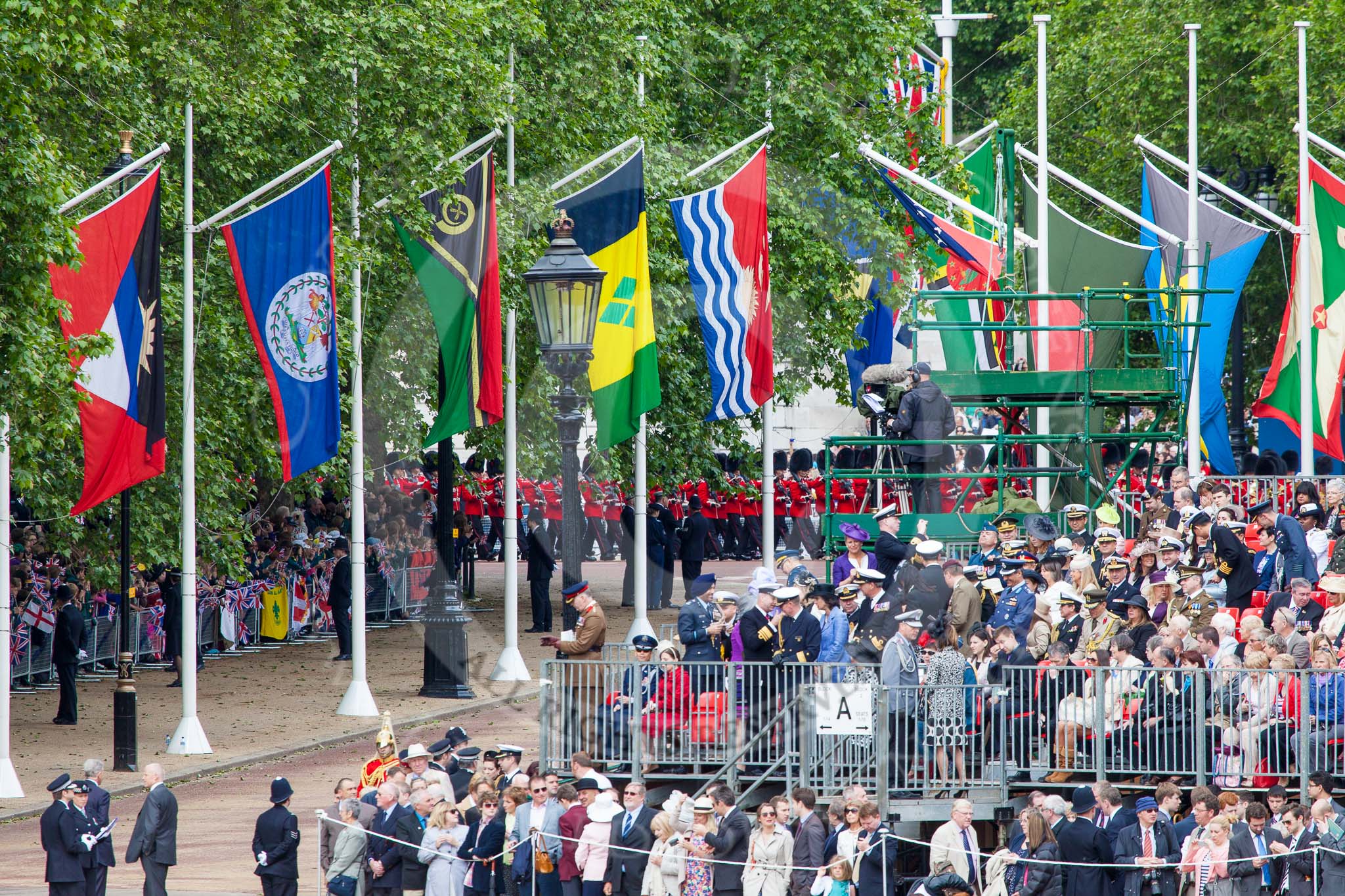 Trooping the Colour 2013: The third band and the first regiment can just been seen marching along The Mall before turning into Horse Guards Road. Image #64, 15 June 2013 10:20 Horse Guards Parade, London, UK