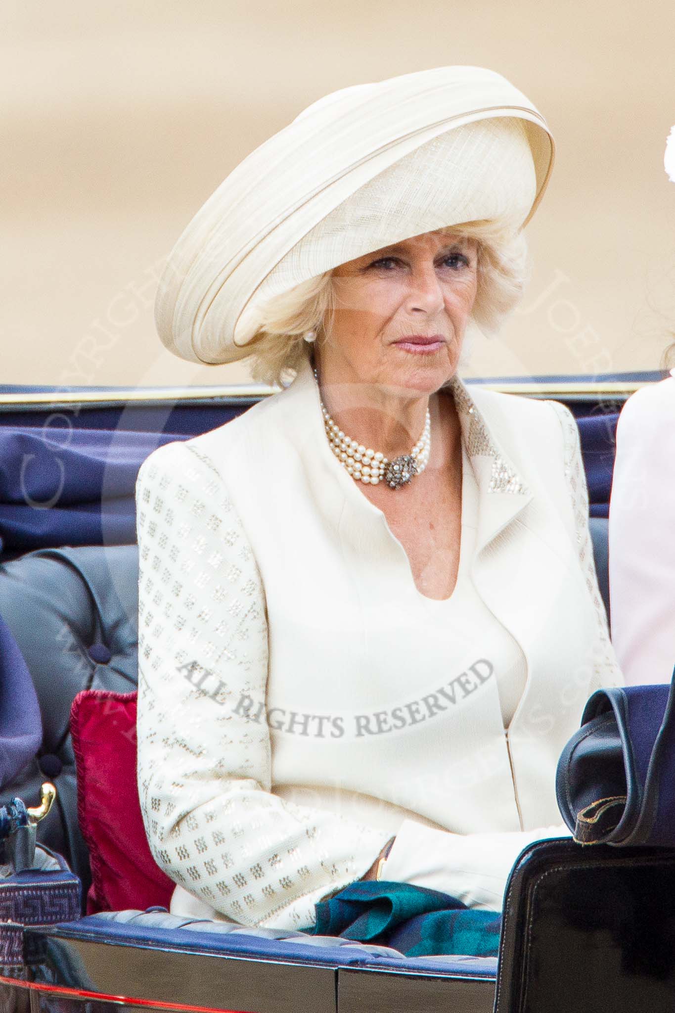 Trooping the Colour 2013: HRH The Duchess of Cornwall  in the first barouche carriage on the way across Horse Guards Parade to watch the parade from the Major General's office..
Horse Guards Parade, Westminster,
London SW1,

United Kingdom,
on 15 June 2013 at 10:50, image #200