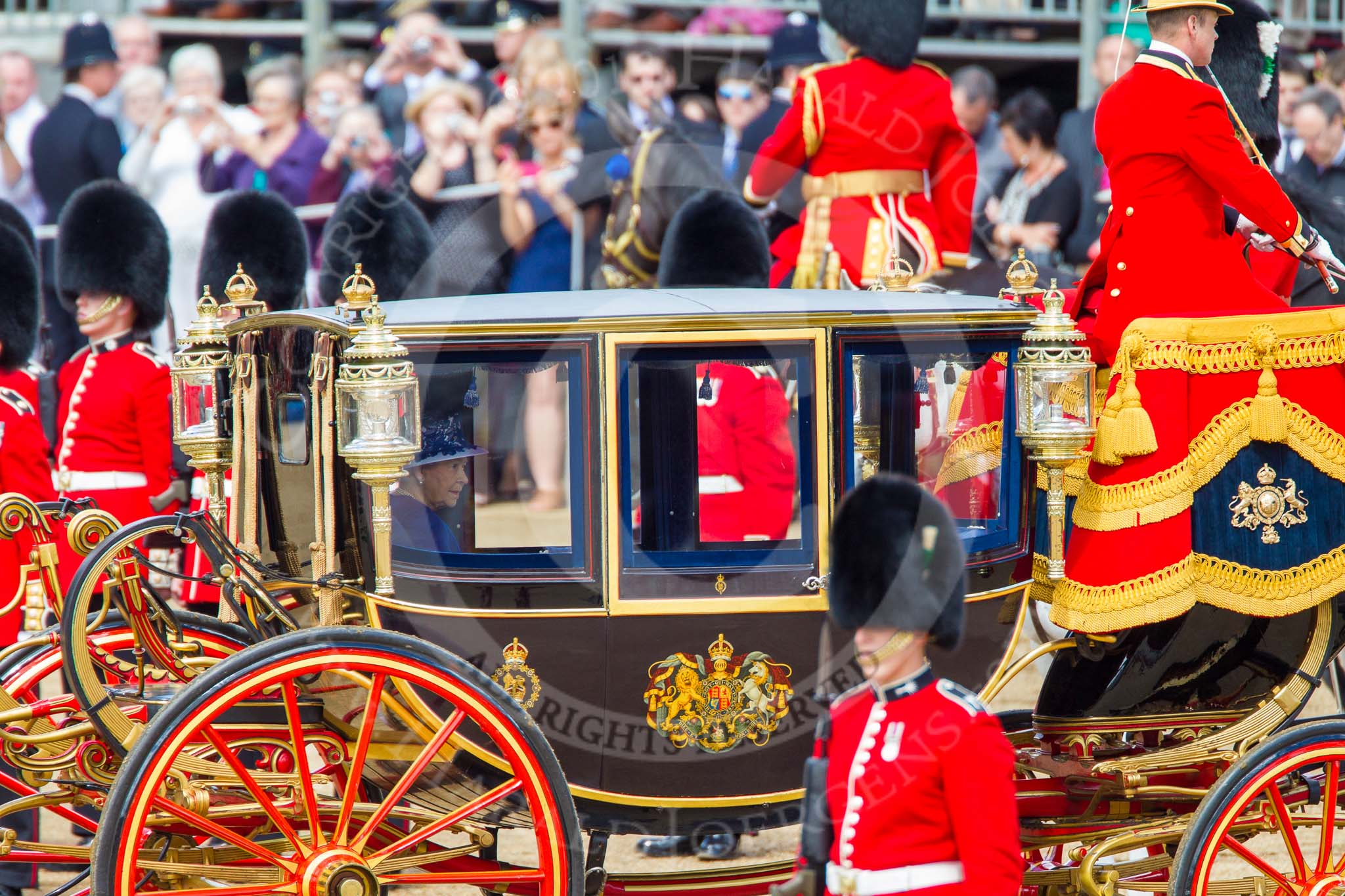 Trooping the Colour 2013: HM The Queen in the Glass Coach during the Inspection of the Line. Image #335, 15 June 2013 11:04 Horse Guards Parade, London, UK