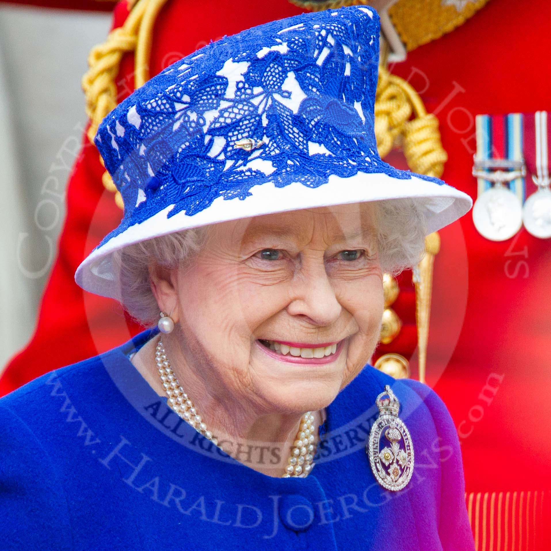 Trooping the Colour 2013: Close-up of HM The Queen, smiling, on the way to dais after the Inspection of the Line..
Horse Guards Parade, Westminster,
London SW1,

United Kingdom,
on 15 June 2013 at 11:08, image #384