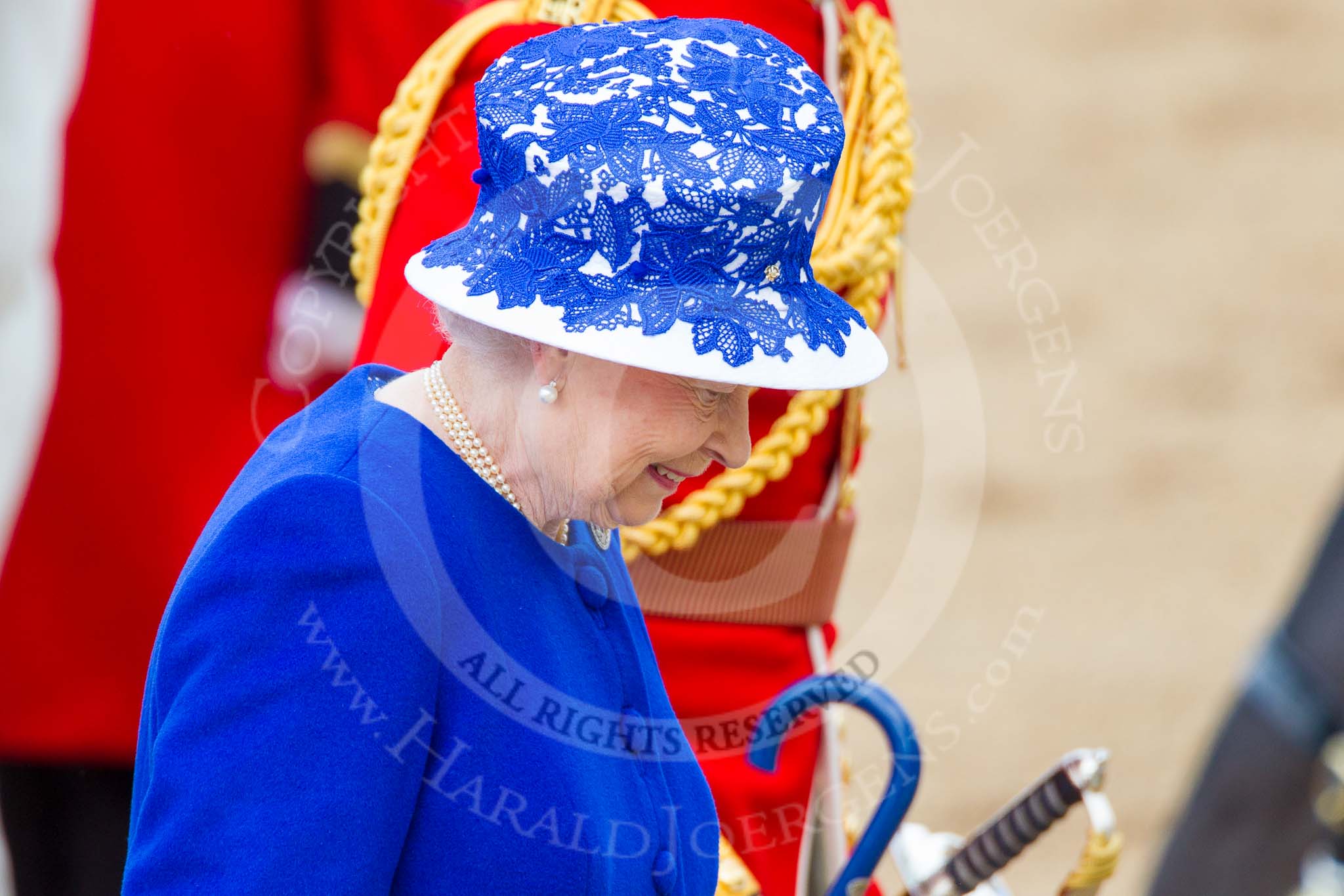 Trooping the Colour 2013: Close-up of HM The Queen, smiling, on the way to dais after the Inspection of the Line. Image #386, 15 June 2013 11:08 Horse Guards Parade, London, UK