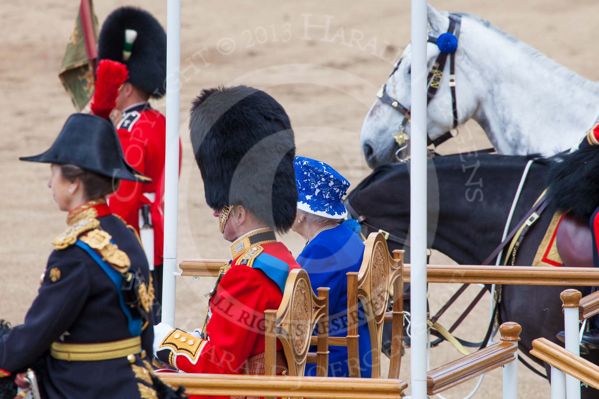 Trooping the Colour 2013: HM The Queen and HRH The Duke of Kent on the dais watching the massed bands troop. Image #401, 15 June 2013 11:11 Horse Guards Parade, London, UK