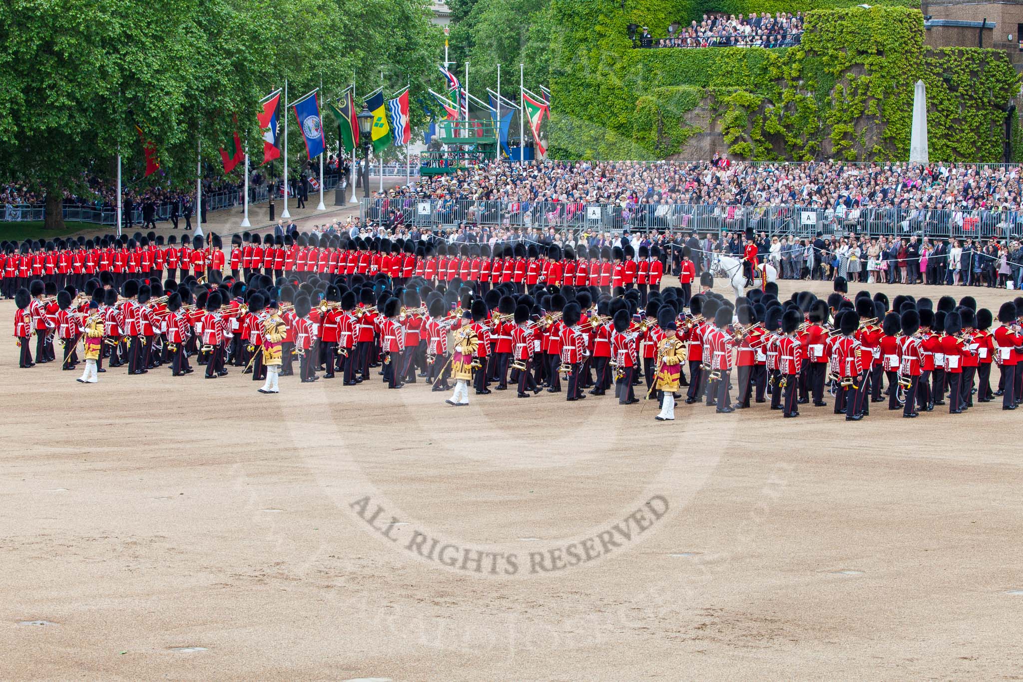 Trooping the Colour 2013: The Massed Band Troop - the countermarch in quick time is Heroes' Return. Behind the massed bands is No. 6 Guard, and next to them the Adjutant of the Parade and the Colour Party. Image #402, 15 June 2013 11:11 Horse Guards Parade, London, UK