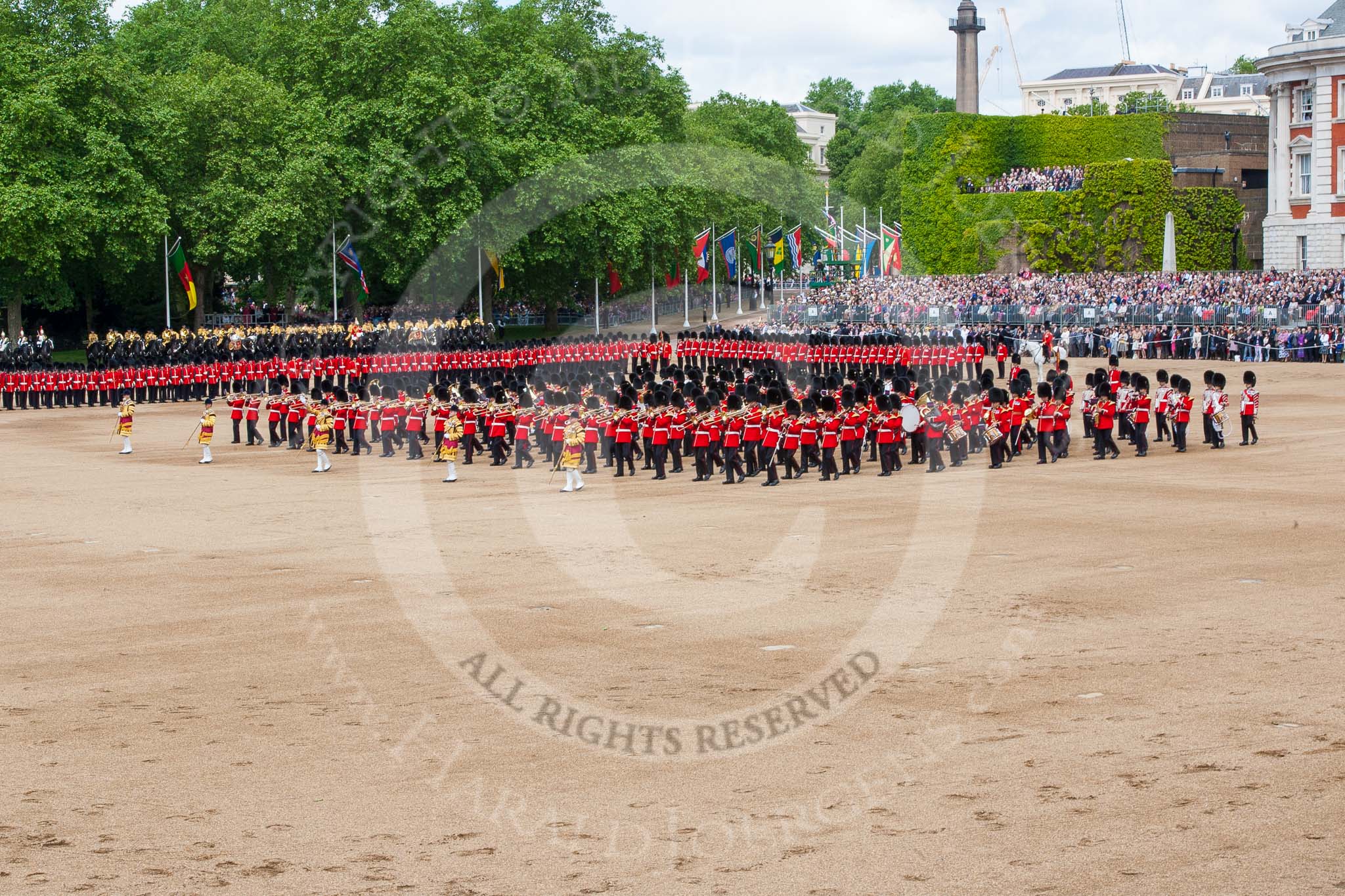 Trooping the Colour 2013: The Massed Band Troop - the countermarch in quick time is Heroes' Return. Behind the massed bands is No. 6 Guard, and next to them the Adjutant of the Parade and the Colour Party. Image #404, 15 June 2013 11:11 Horse Guards Parade, London, UK