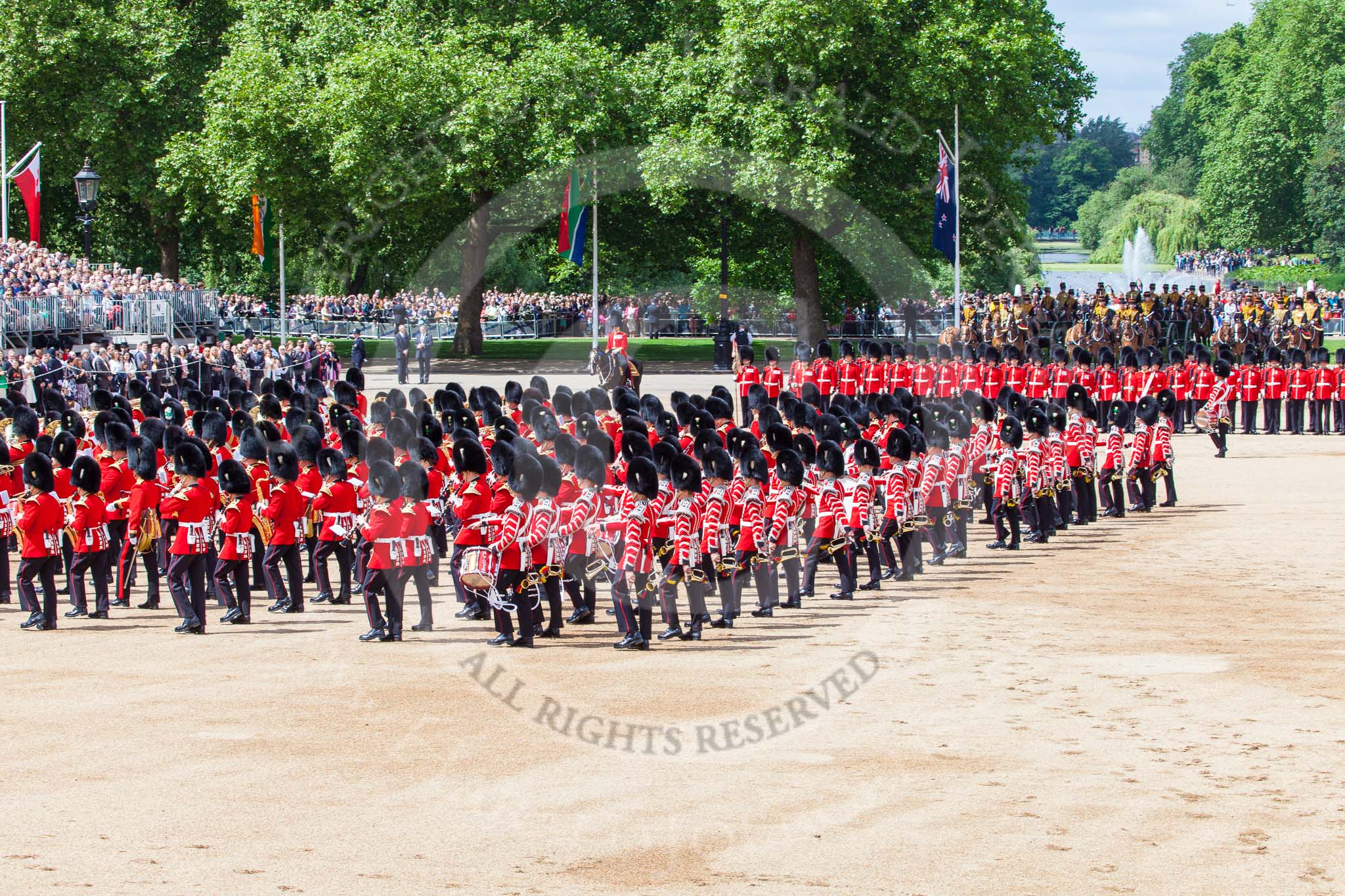 Trooping the Colour 2013: The Massed Band Troop - the final stages of the countermarch. The Lone Drummer, in the top right of the image, has broken away, and is marching to the right of No. 1 Guard. Image #417, 15 June 2013 11:13 Horse Guards Parade, London, UK